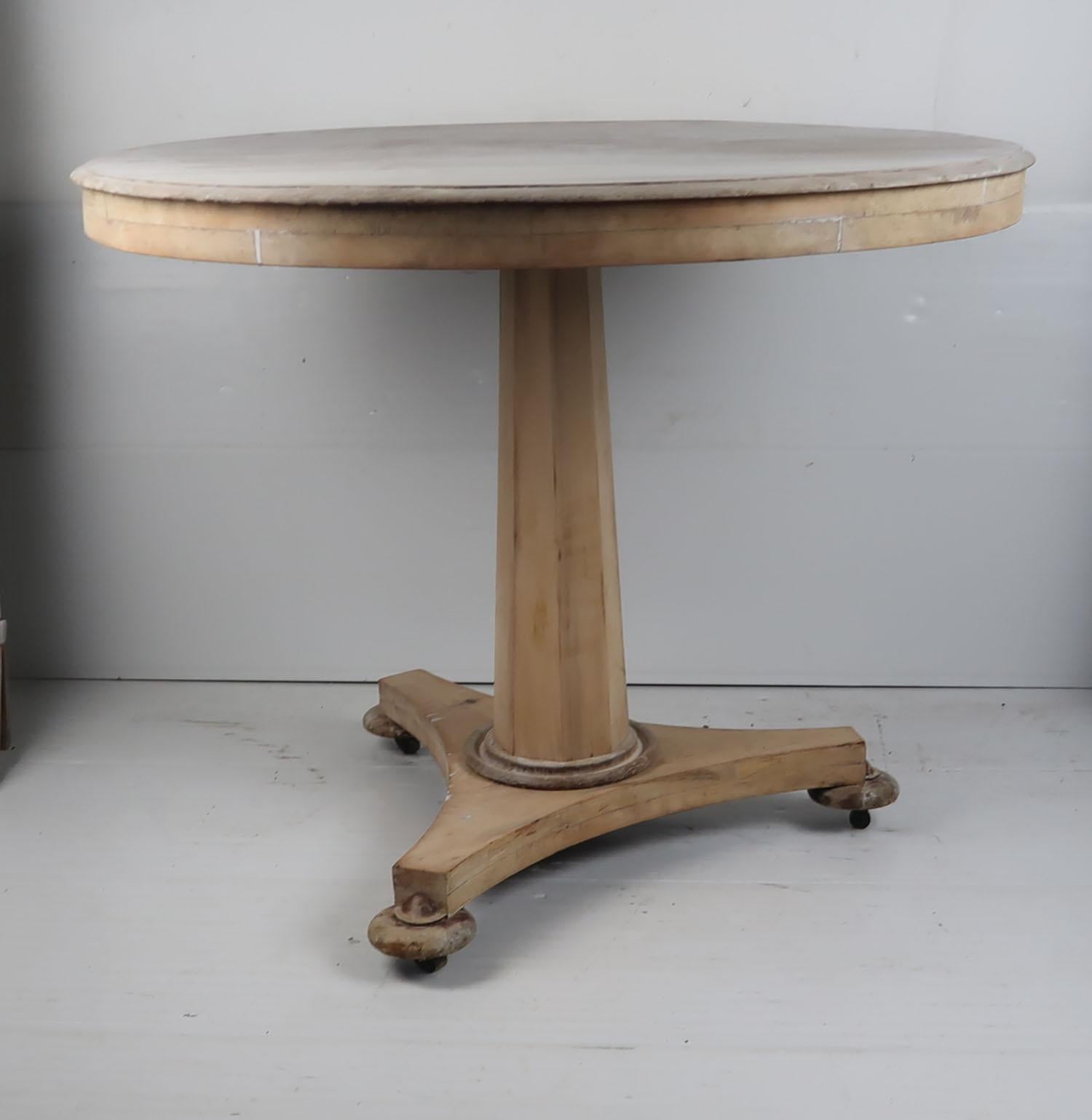 small round pine table