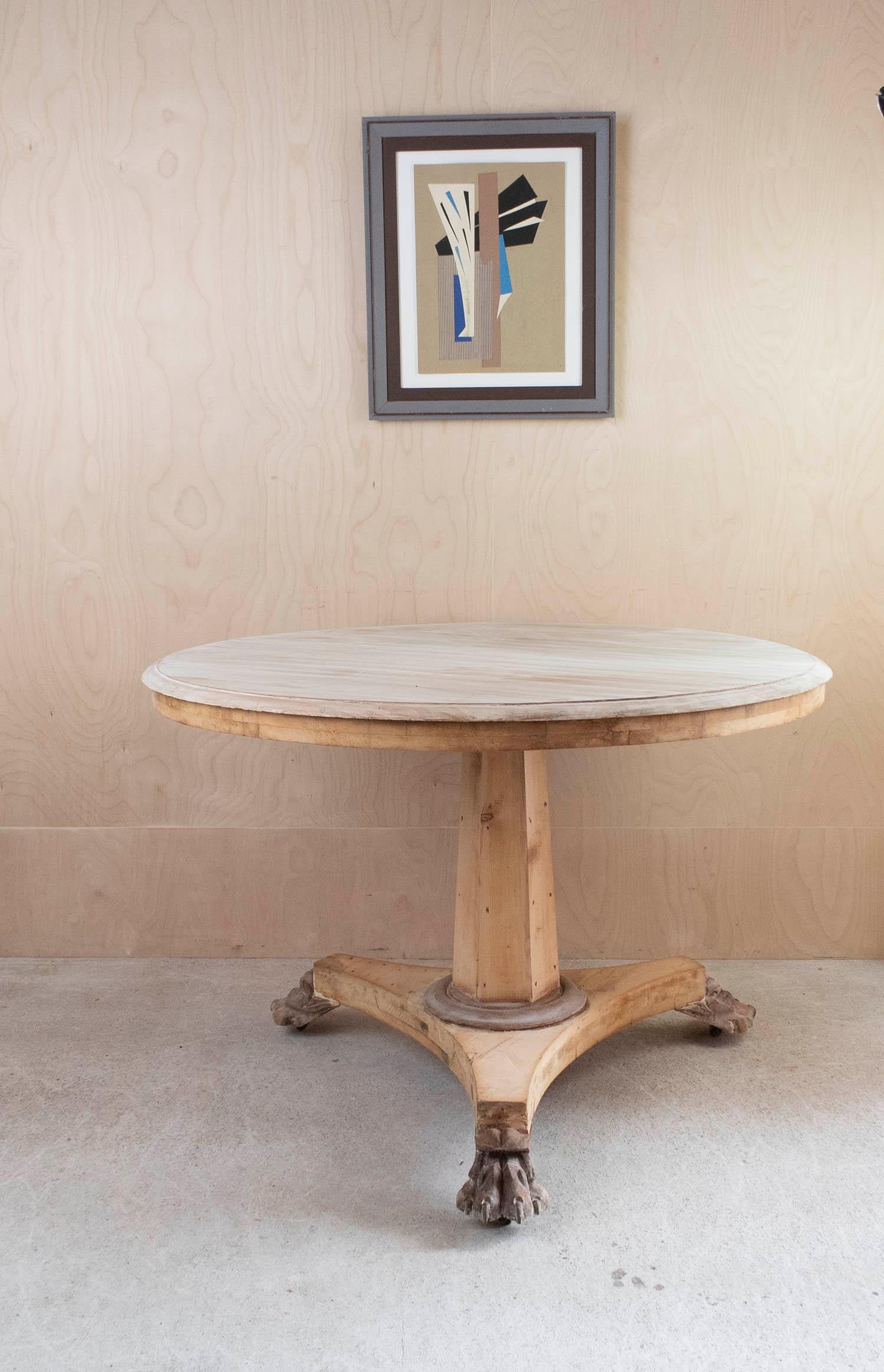 Fabulous small round table. Made from bleached tropical hardwood and pine

Amazing carved lion paw feet

I particularly like its simplicity.

I have chosen not to lacquer or wax the table.

Original brass castors. 

Free UK delivery.









