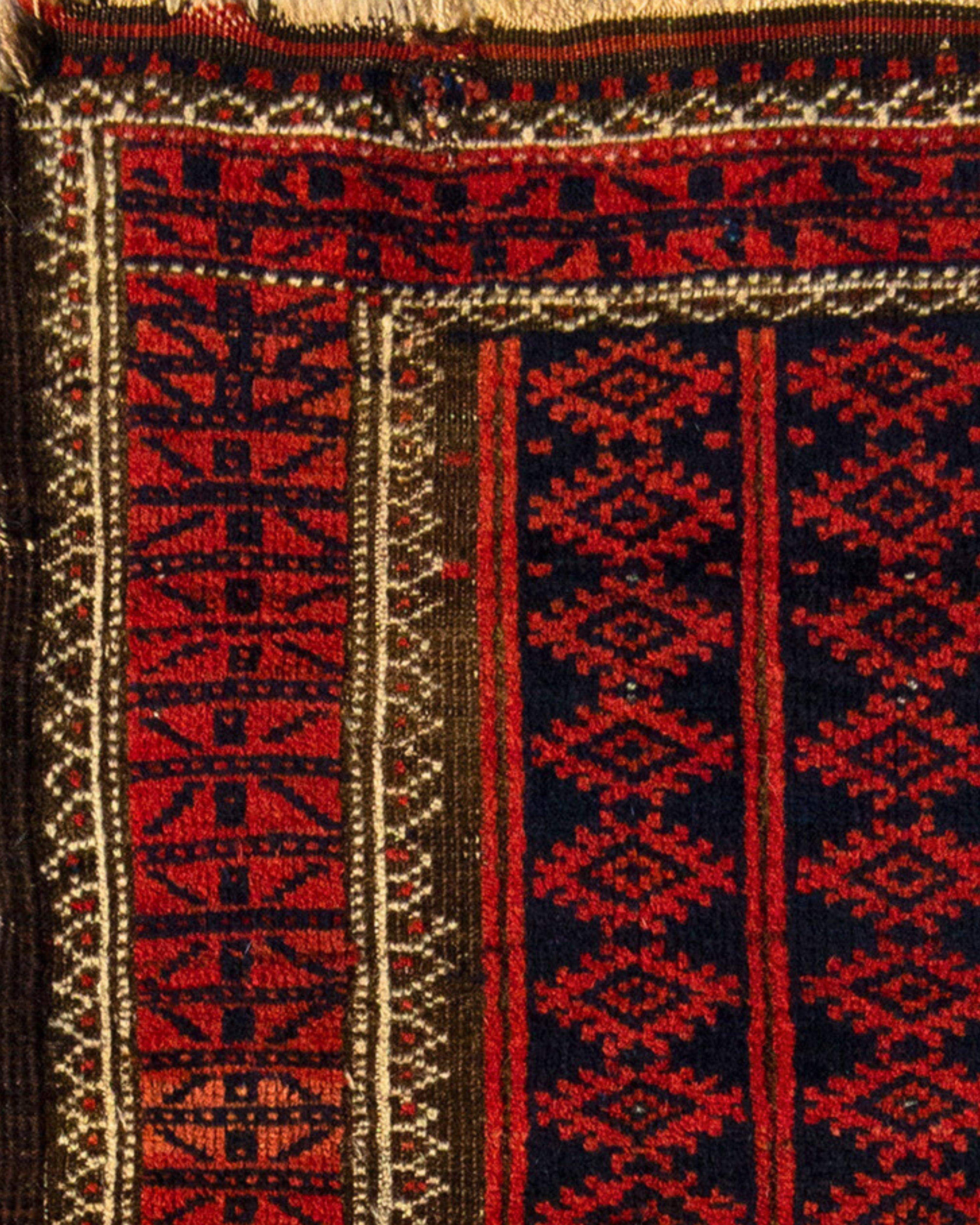 Wool Small Antique Persian Baluch Rug, Late 19th Century