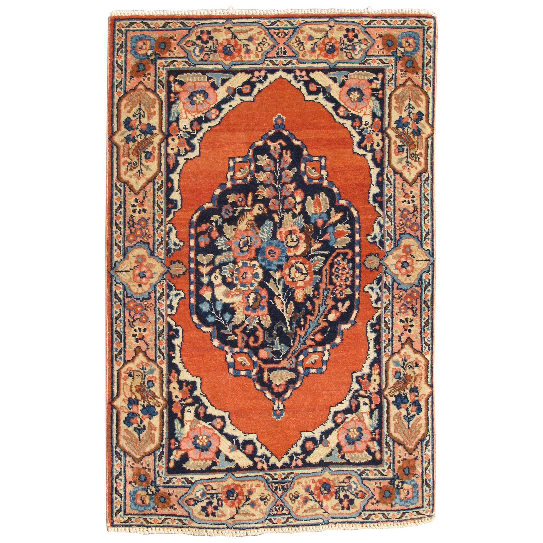 Petit tapis persan ancien de Tabriz à motifs floraux ornés en orange brûlé