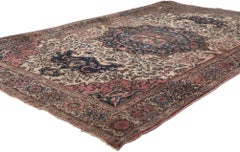 Petit tapis sarouk persan ancien, un style intemporel et un charme durable