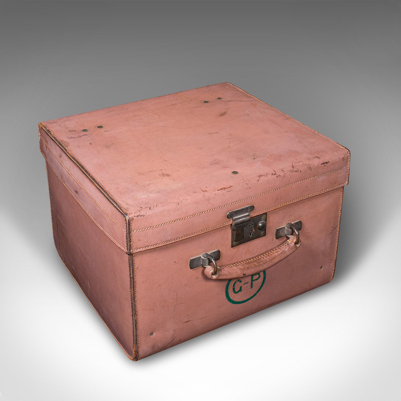 
This is a small antique picnic case. An English, leather suitcase by John Pound & Co, dating to the early 20th century, circa 1920.

Delightfully distinctive colours to this charming away day picnic case
Displays a desirable aged patina and in good