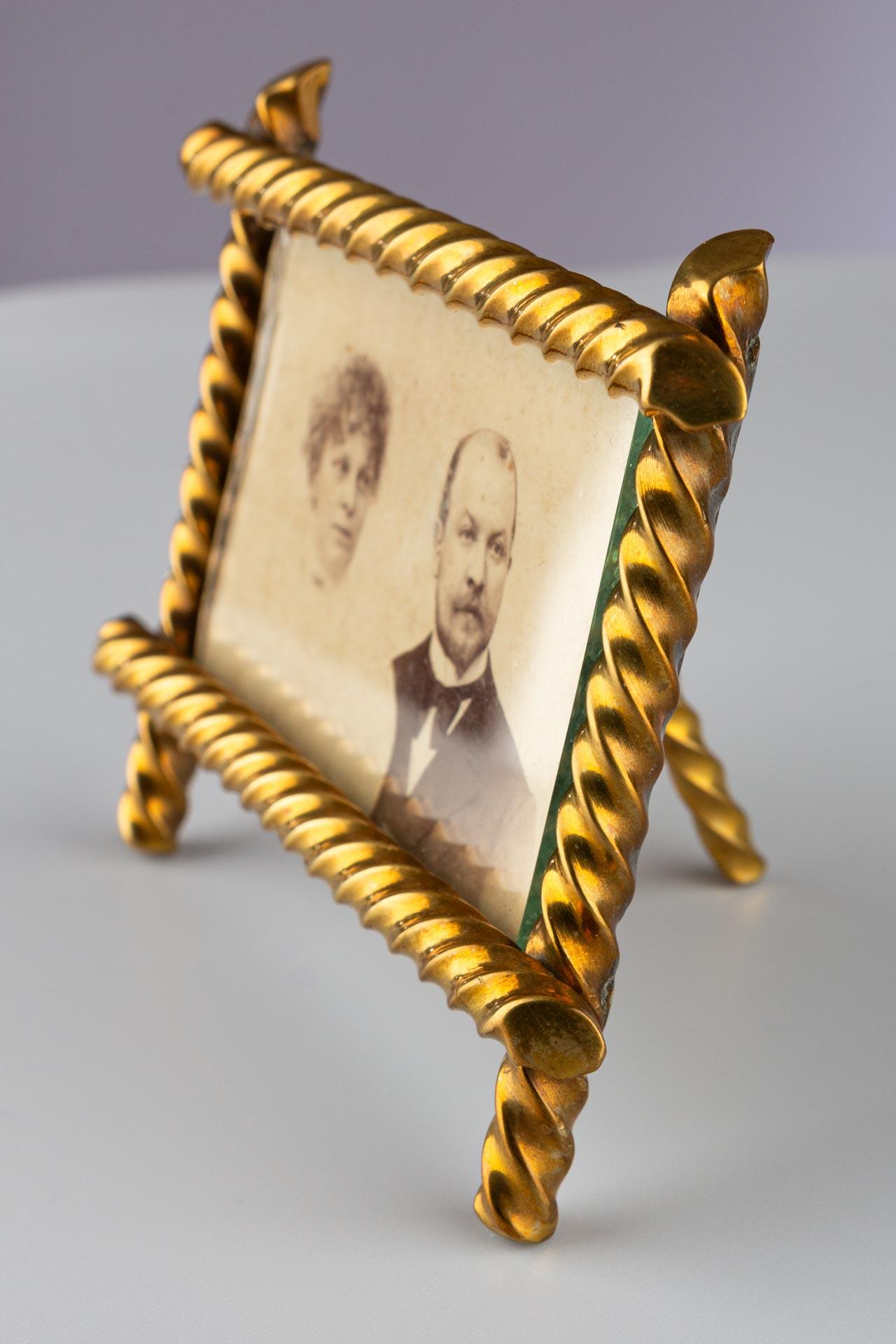 Beautiful brass picture frame, France circa 1880.
Picture size: 6,5 cm x 4 cm.

French picture frames from the Victorian era are an expression of an epoch that was known for its decorative wealth and appreciation of art and craftsmanship. Their