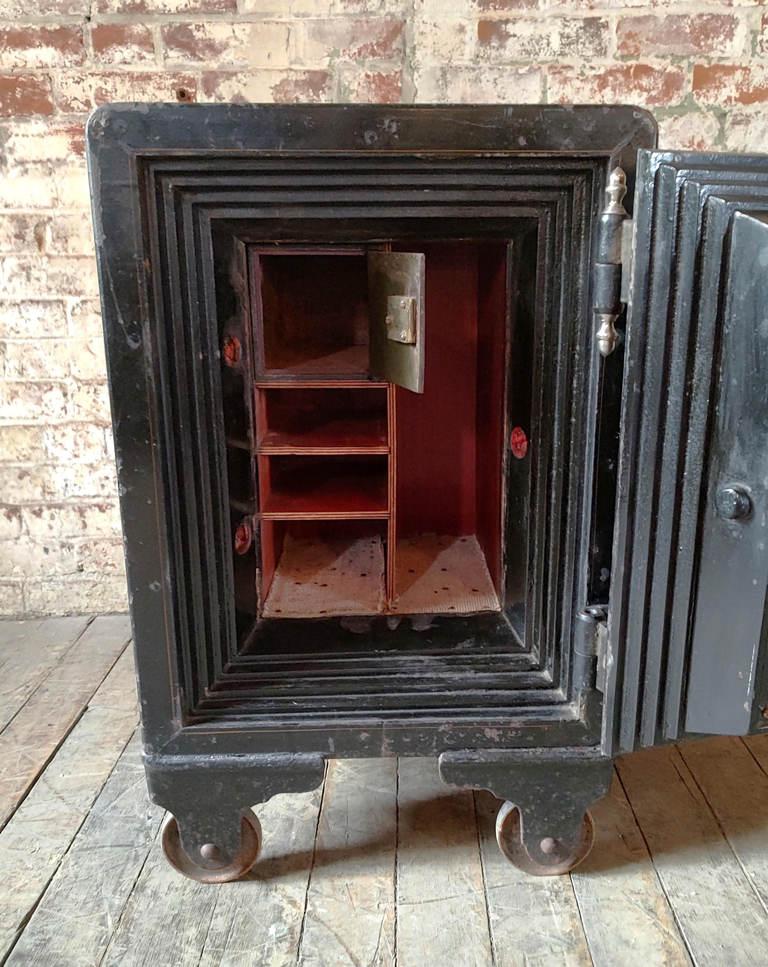 Small Antique Rolling Floor Safe by Victor Co. For Sale 4