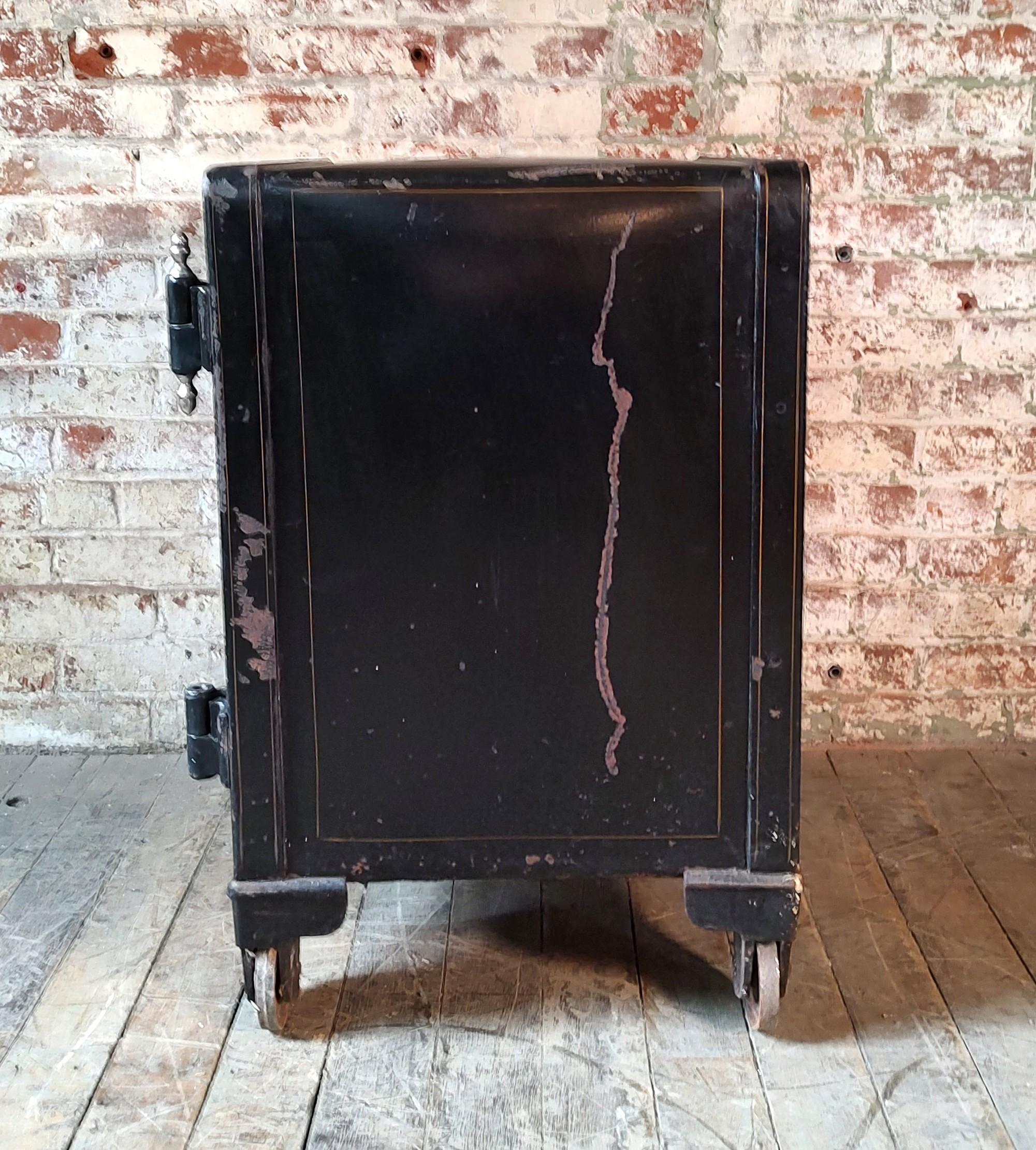 Steel Small Antique Rolling Floor Safe by Victor Co. For Sale