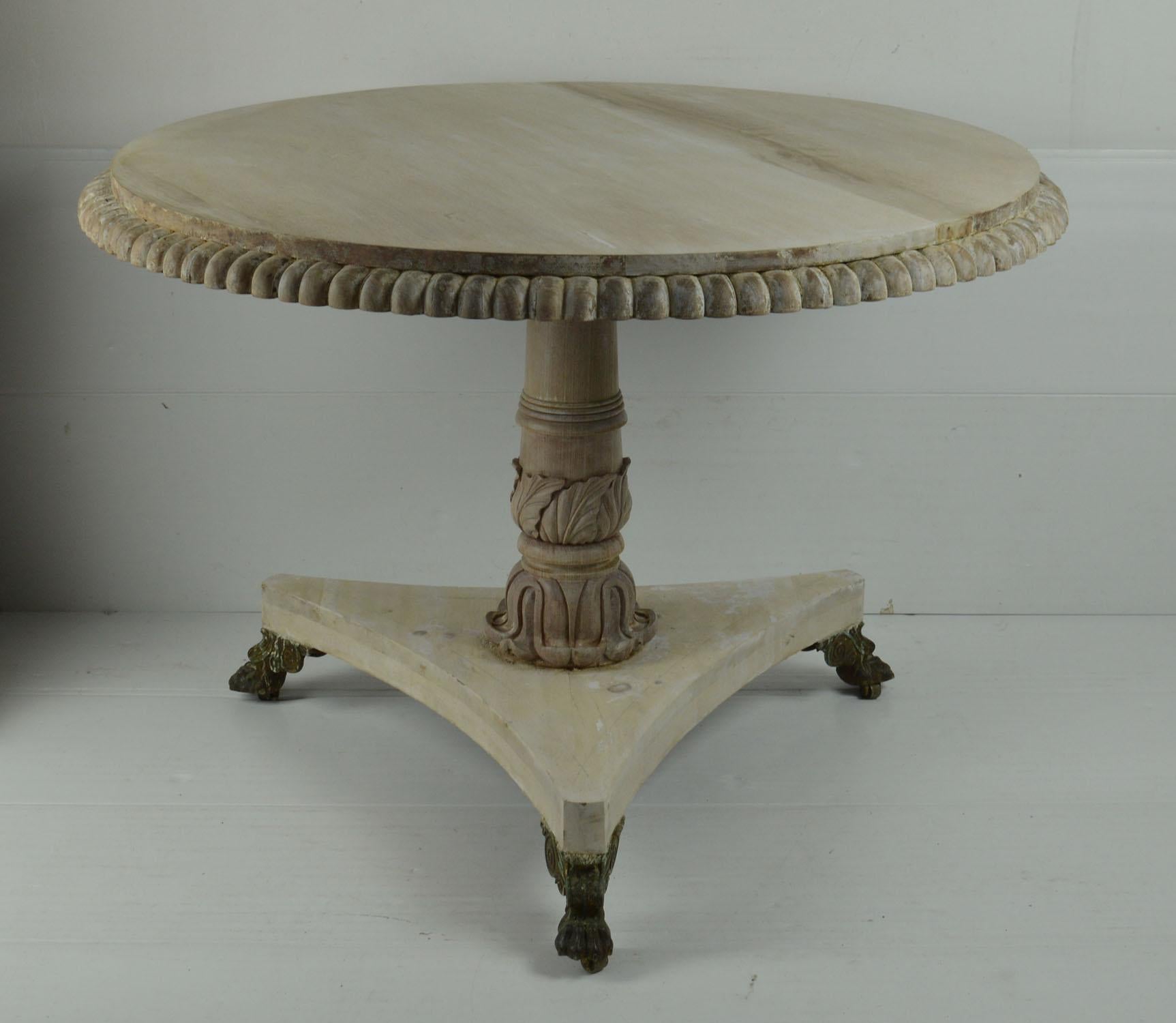 Fabulous small round table. Made from bleached Honduras mahogany and pine

I particularly like the exaggerated gadrooning to the top edge and the fabulous gilt metal feet.

Beautifully figured top. 

On the original brass castors. 

I have