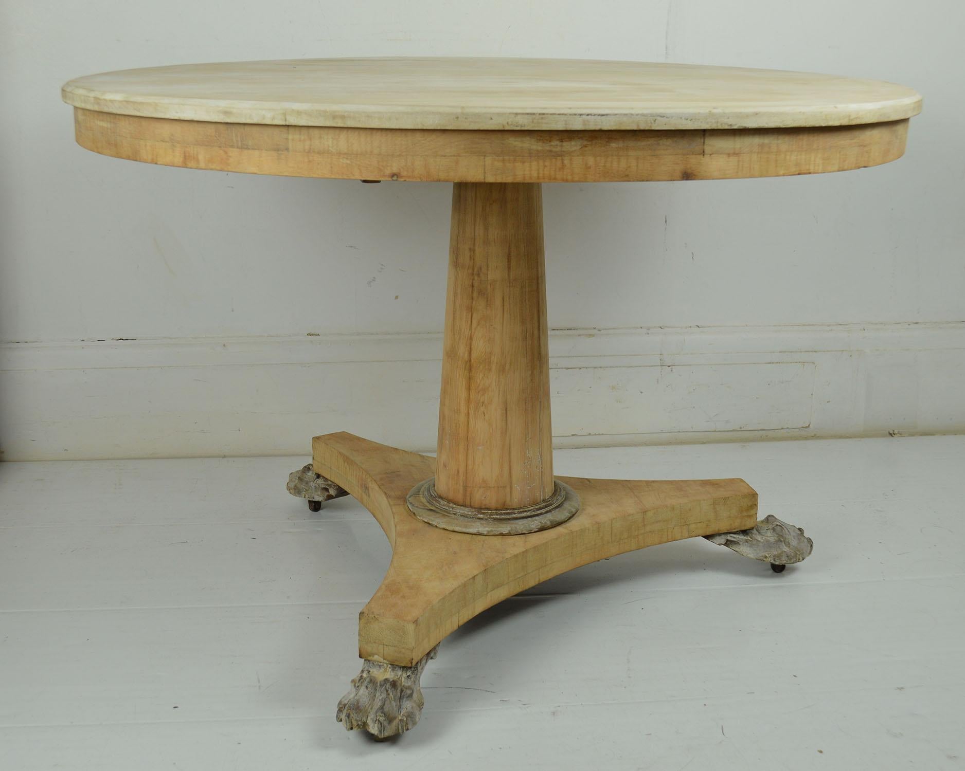 Fabulous small round table. Made from bleached Honduras mahogany, pine and rosewood.

I particularly like the simplicity of this table

Beautifully figured top. Cylindrical column support and finely carved paw feet.

On the original castors.