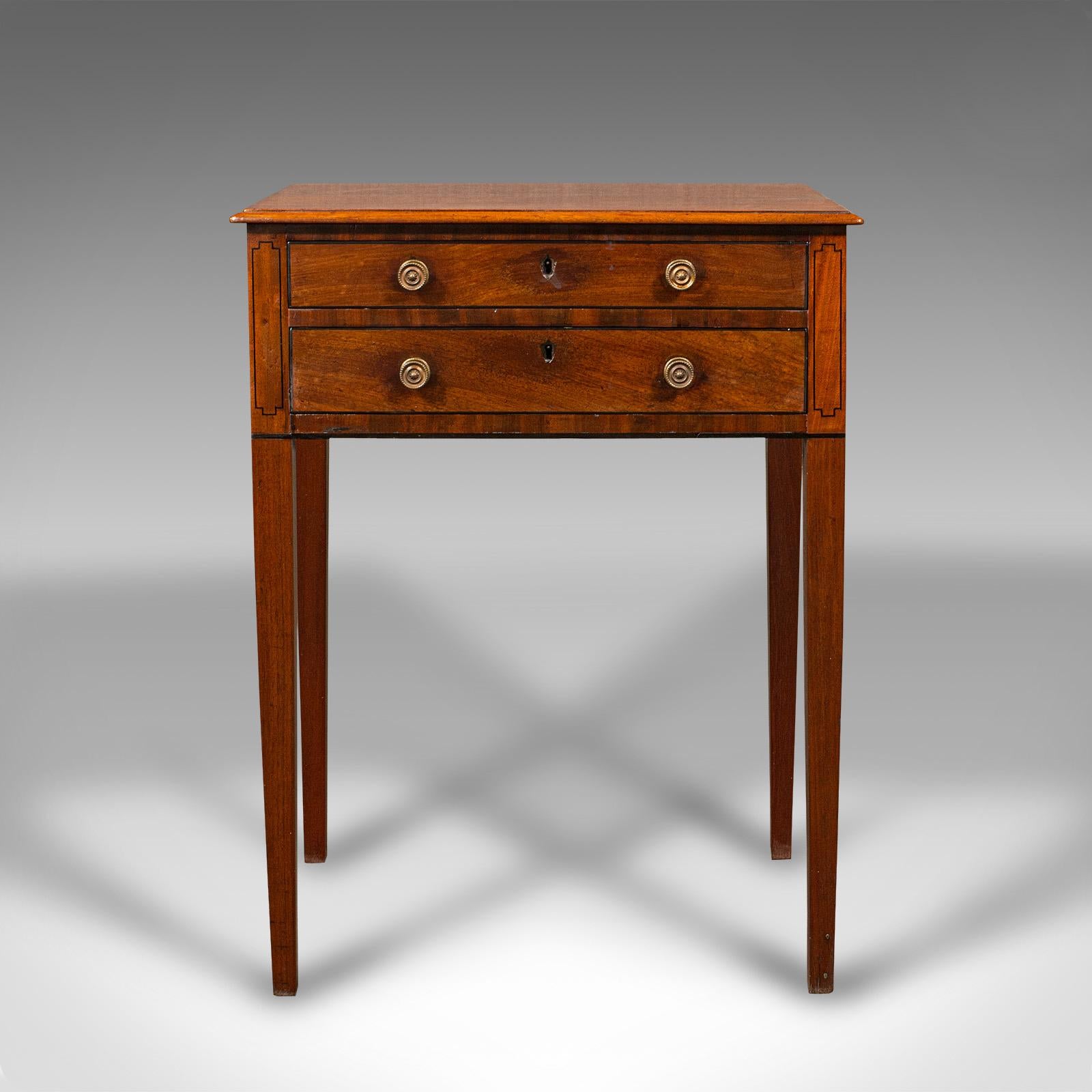 This is a small antique sewing table. An English, mahogany bureau or correspondence desk, dating to the Regency period, circa 1820.

Superb craftsmanship with pleasingly diminutive proportions
Displays a desirable aged patina and in very good