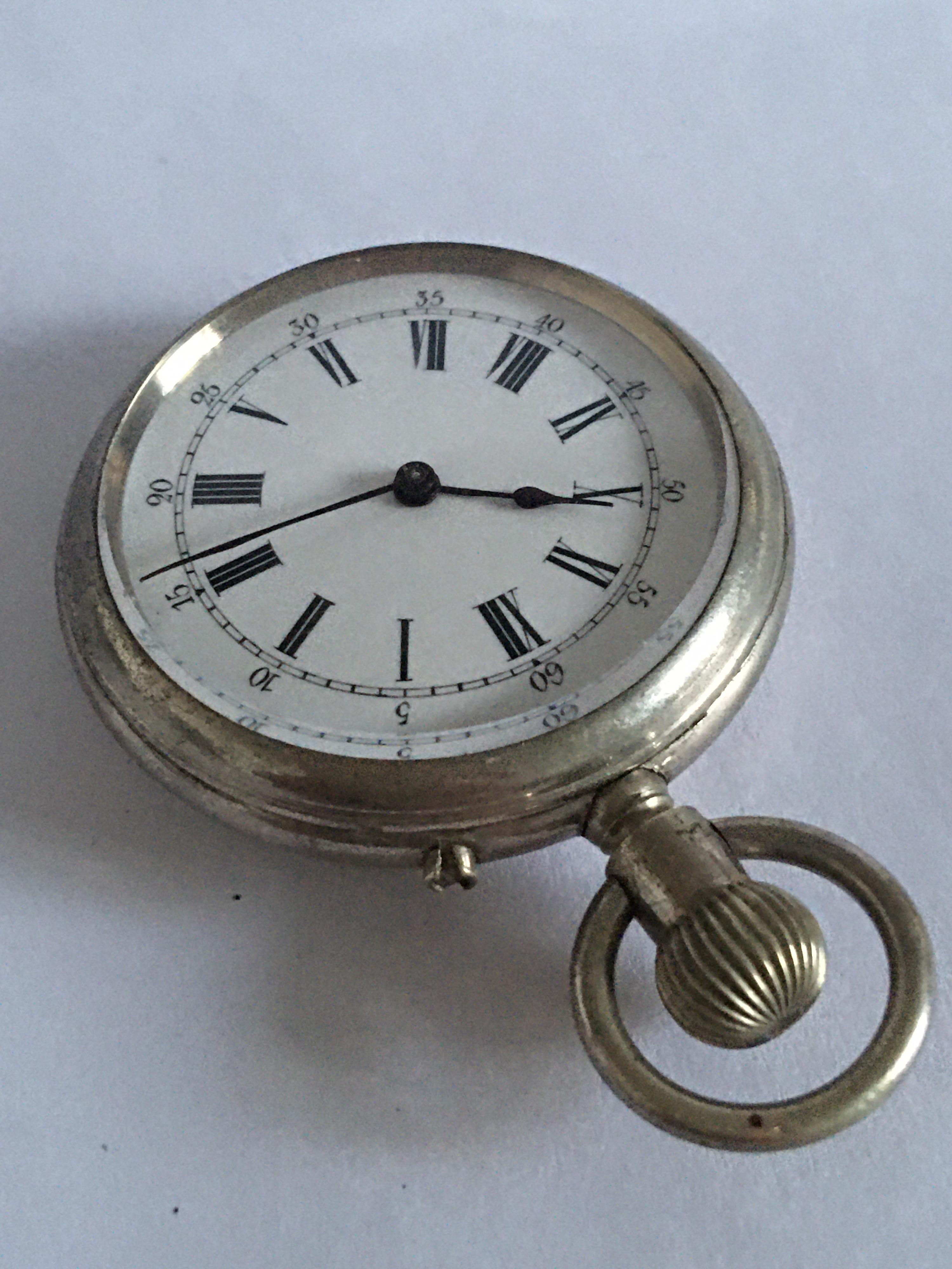 This lovely small watch is working and ticking well. 
Back cover case is a bit tarnished as shown. 

Please study the images carefully as form part of the description. 