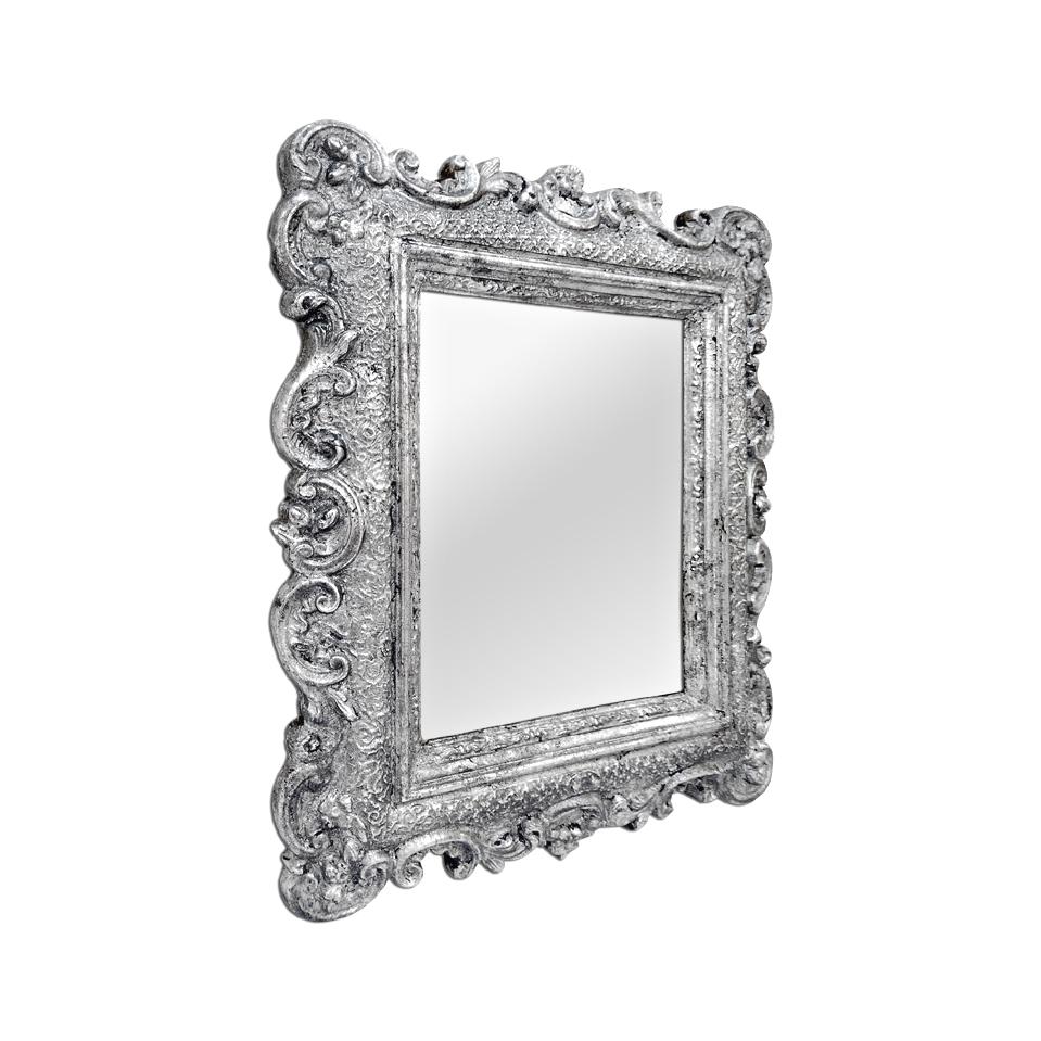 Small antique French mirror Napoleon III period in baroque style decorated with volutes, circa 1890. Silvered wood patinated antique frame. Re-gilding to the leaf patinated. Antique frame width 7 cm / 2.75 in. Modern glass mirror. Antique wood back.