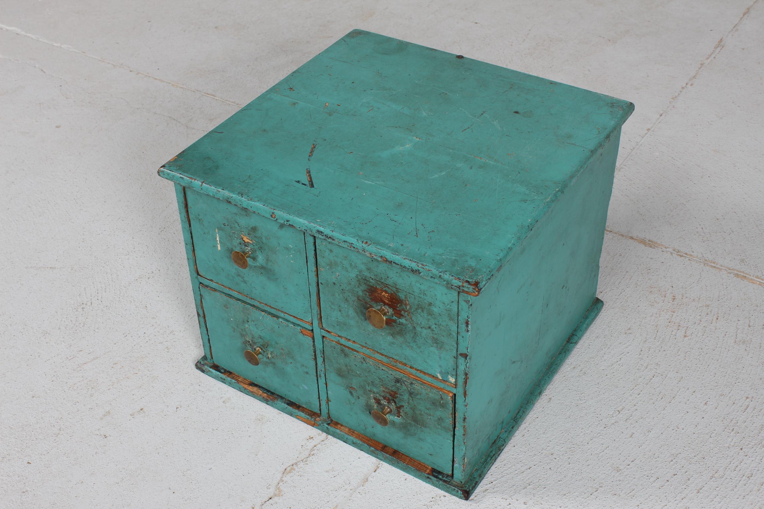 small green chest of drawers