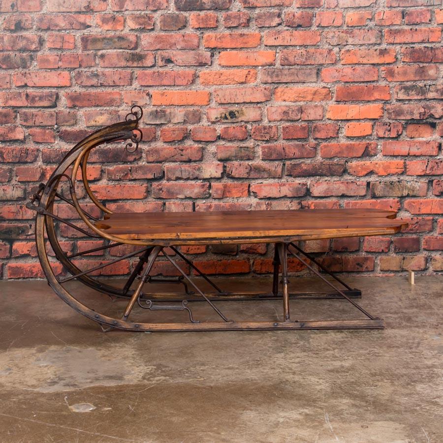 All original, this small 19th century Swedish sled makes the perfect coffee table and conversation piece. The iron and wood surface are in remarkable condition; sealed, sturdy and ready for use. Please take a moment to enlarge the photos and examine