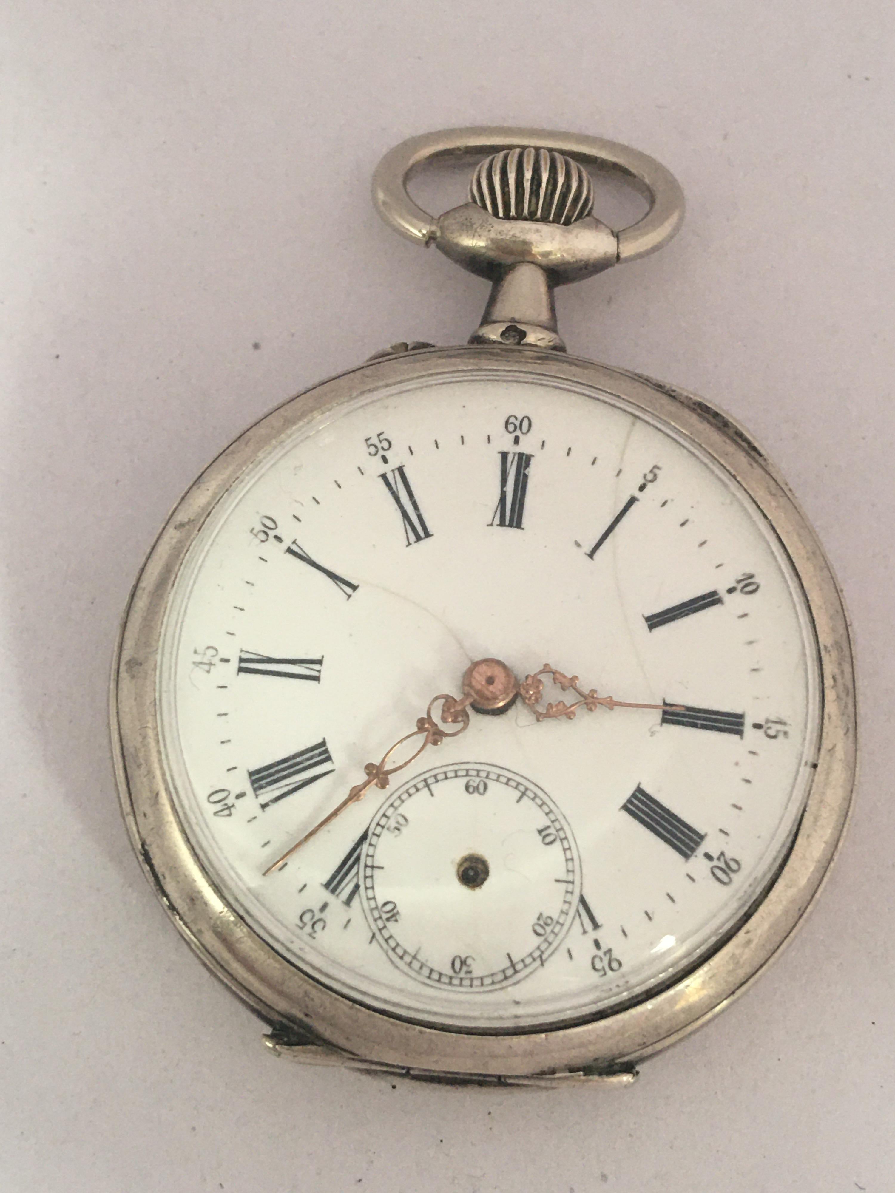 This beautiful antique 40mm diameter hand winding silver pocket watch is in good working condition and it is running well. Visible signs of ageing and wear with some dents on the side case and small light marks on the glass and on the case as shown.