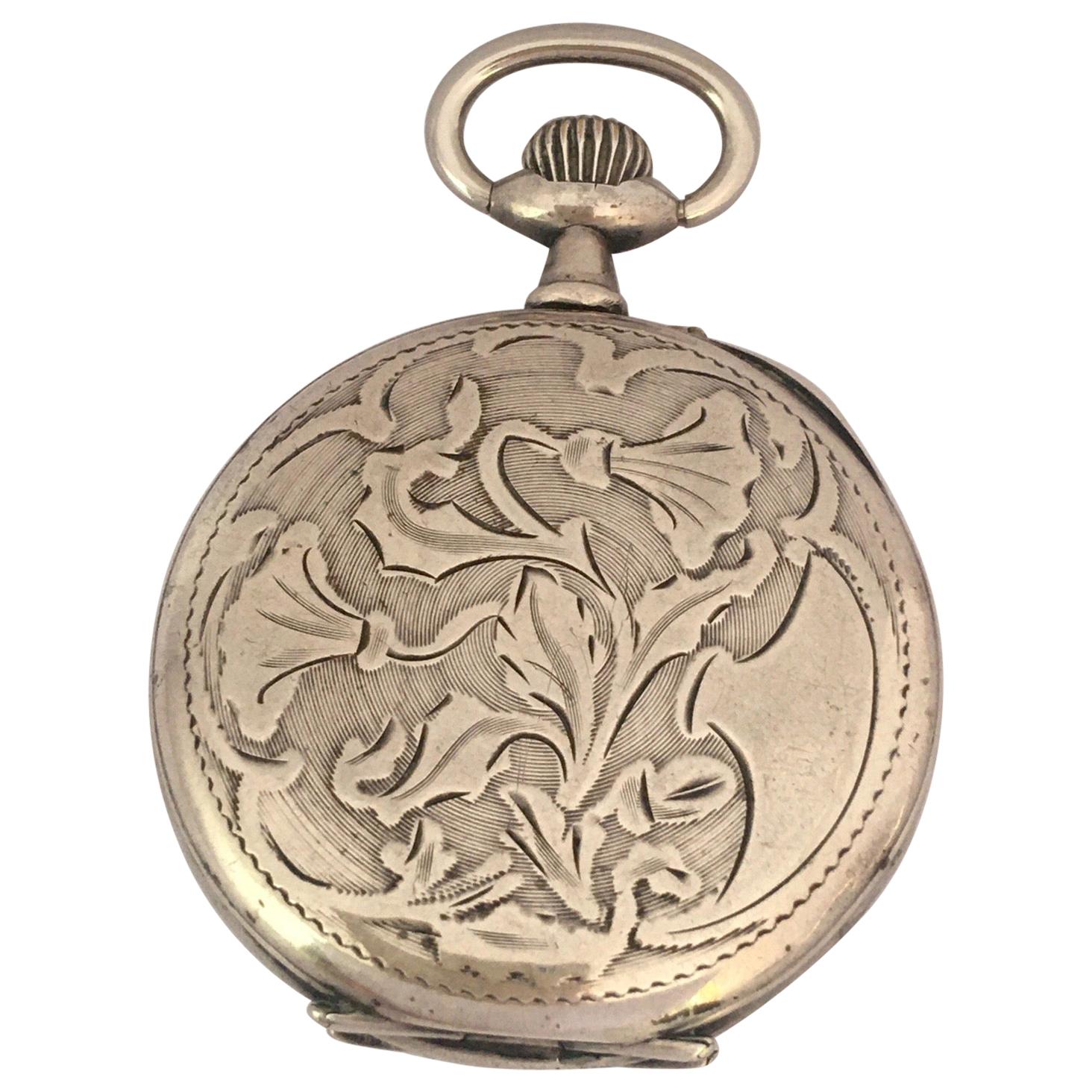 Small Antique Swiss Mechanical Silver Pocket Watch For Sale