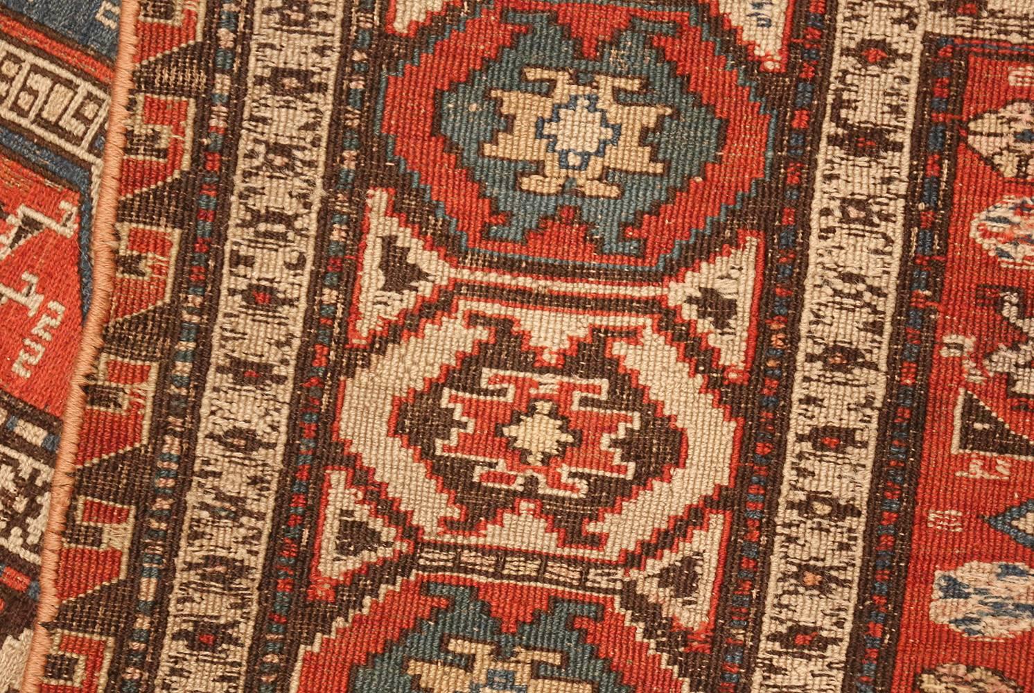 Beautiful Small Antique Tribal Soumak Caucasian Rug, Country of Origin / Rug Type: Caucasian Rug, Circa Date: 1900 – Size: 4 ft 4 in x 6 ft 5 in (1.32 m x 1.96 m)

Well balanced and vibrant, this antique Soumak rug makes a bold statement in any