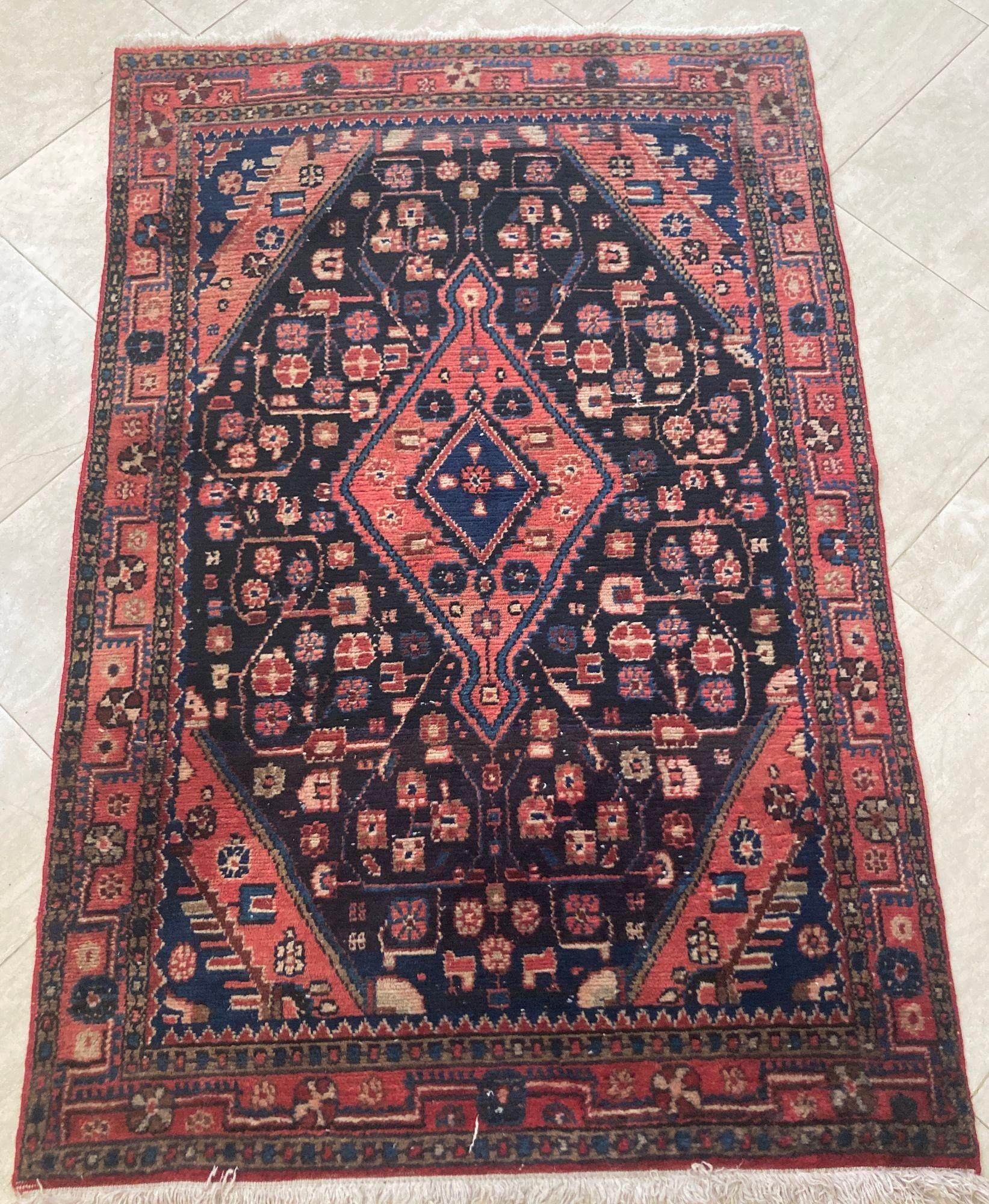 Hand-knotted antique ethnic rug from Eastern Turkey,
circa 1940. Size: 3ft 6 in x 5ft 8in.
Traditional Turkish carpet with floral abstract design.
Antique oriental accent rug - carpet - mat in dark blue, pink, white and black colors in floral and