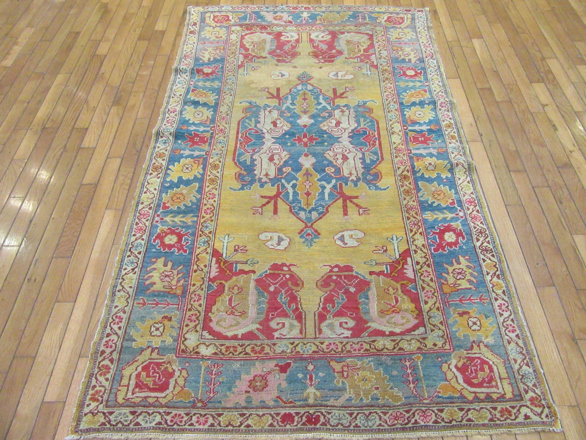 Late 19th Century Small Antique Hand knotted Wool Turkish Oushak Rug For Sale