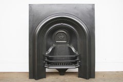 Small antique Victorian cast iron arched fireplace grate