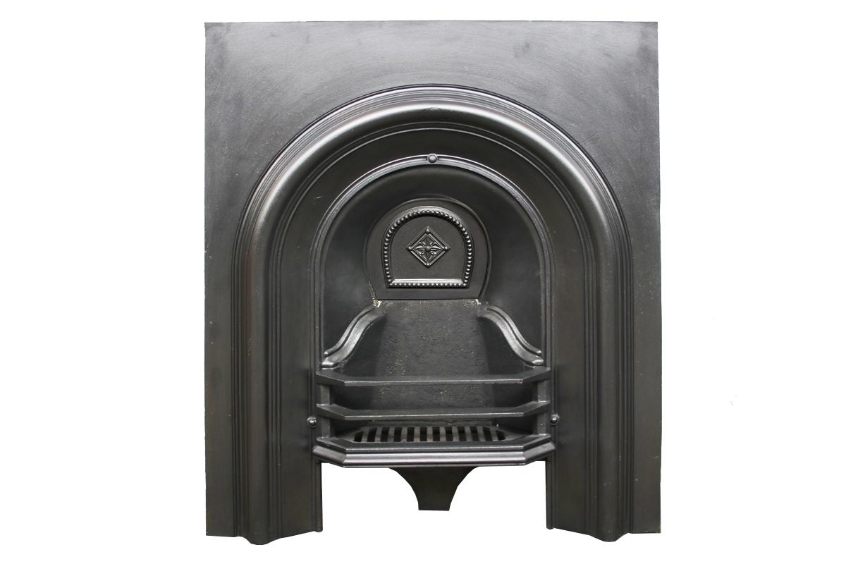 Iron Small antique Victorian cast iron arched fireplace grate For Sale
