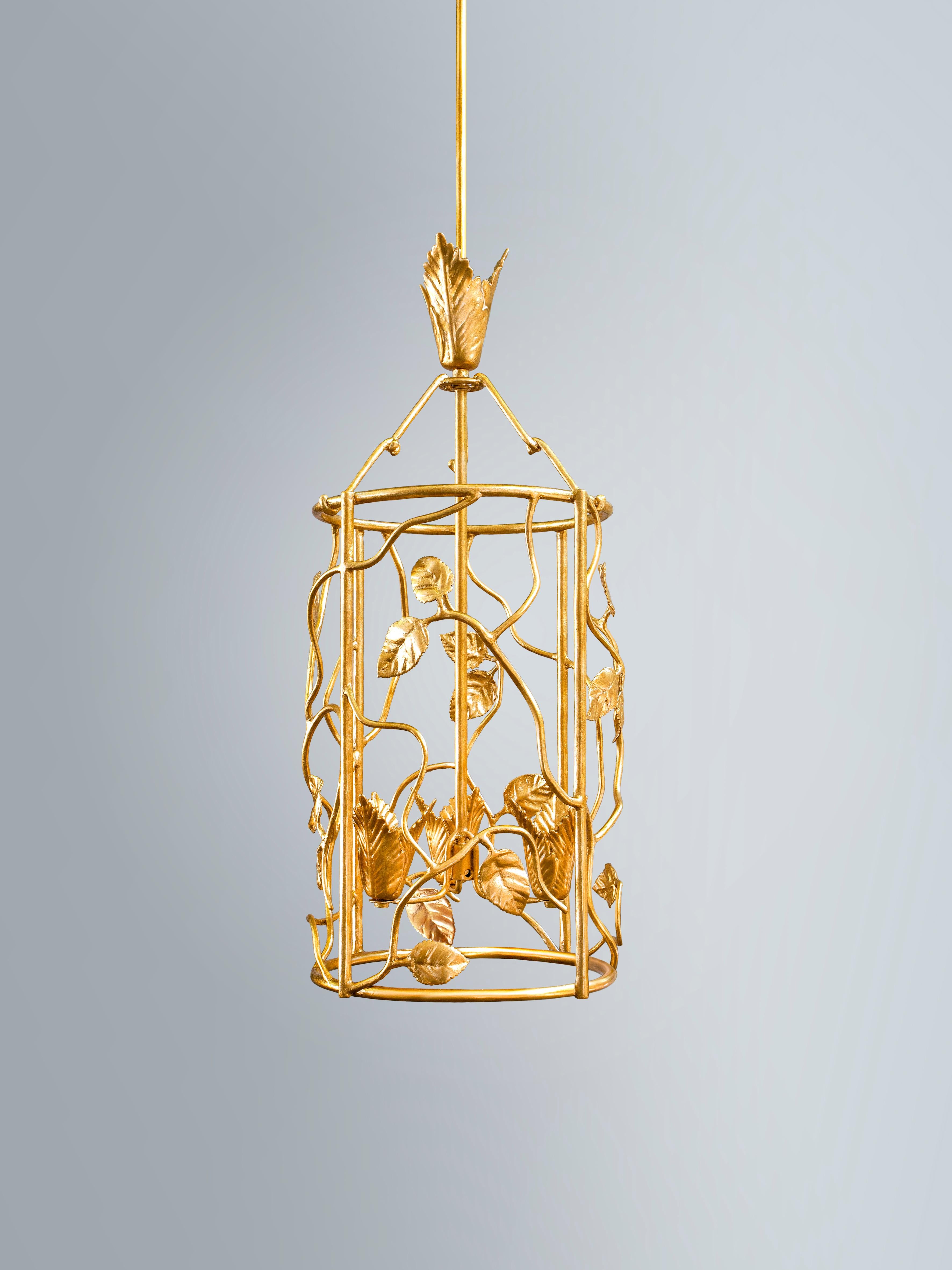 With rose leaves interspersed on a textured frame, this lantern resembles a piece of naturalistic sculpture. Uplighter with 3 bulbs. 
Please note these lantern are customisable- can be crafted in different sizes and finishes.There is a small and