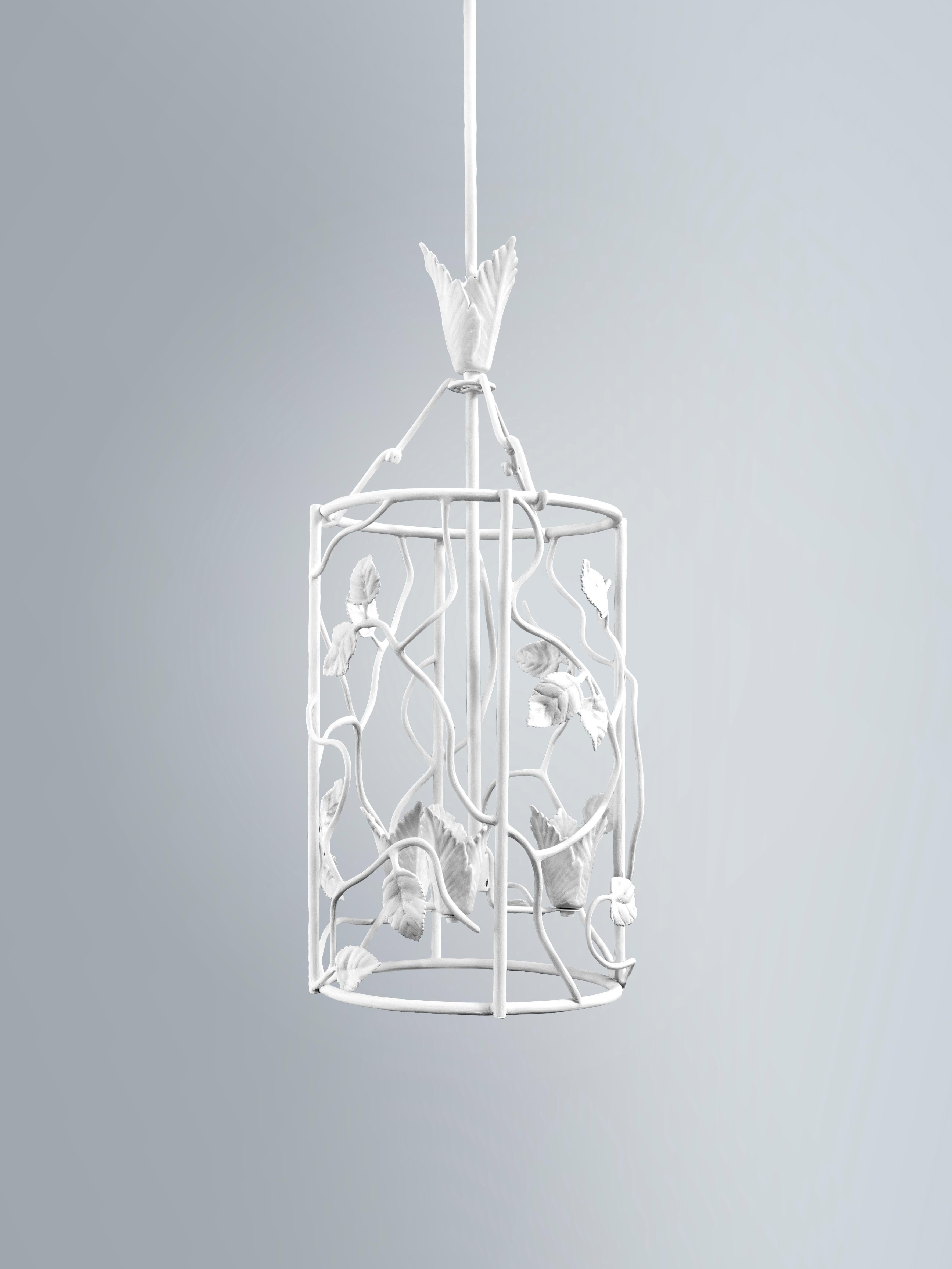 With rose leaves interspersed on a textured frame, this lantern resembles a piece of naturalistic sculpture. Uplighter with 3 bulbs. 
Please note these lantern are customisable- can be crafted in different sizes and finishes.There is a small and