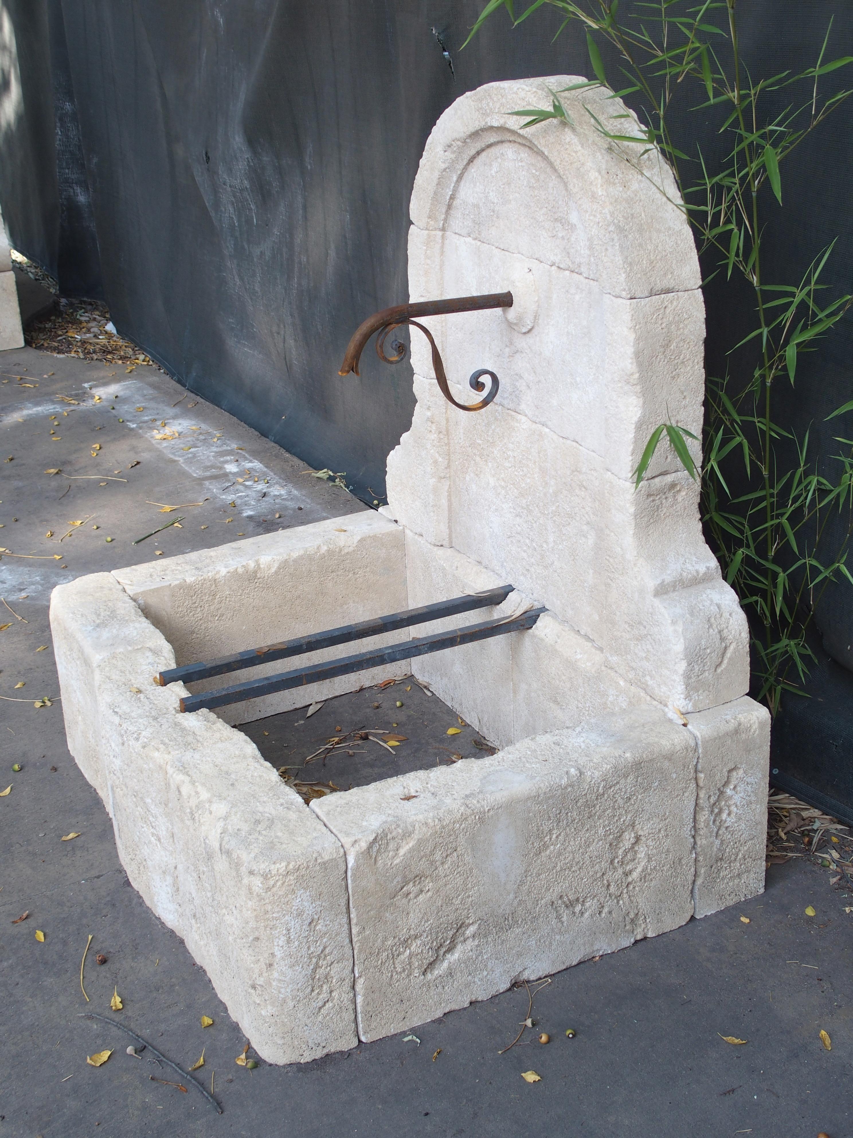 Hand-Carved Small Arched Top Limestone Wall Fountain from Provence, France