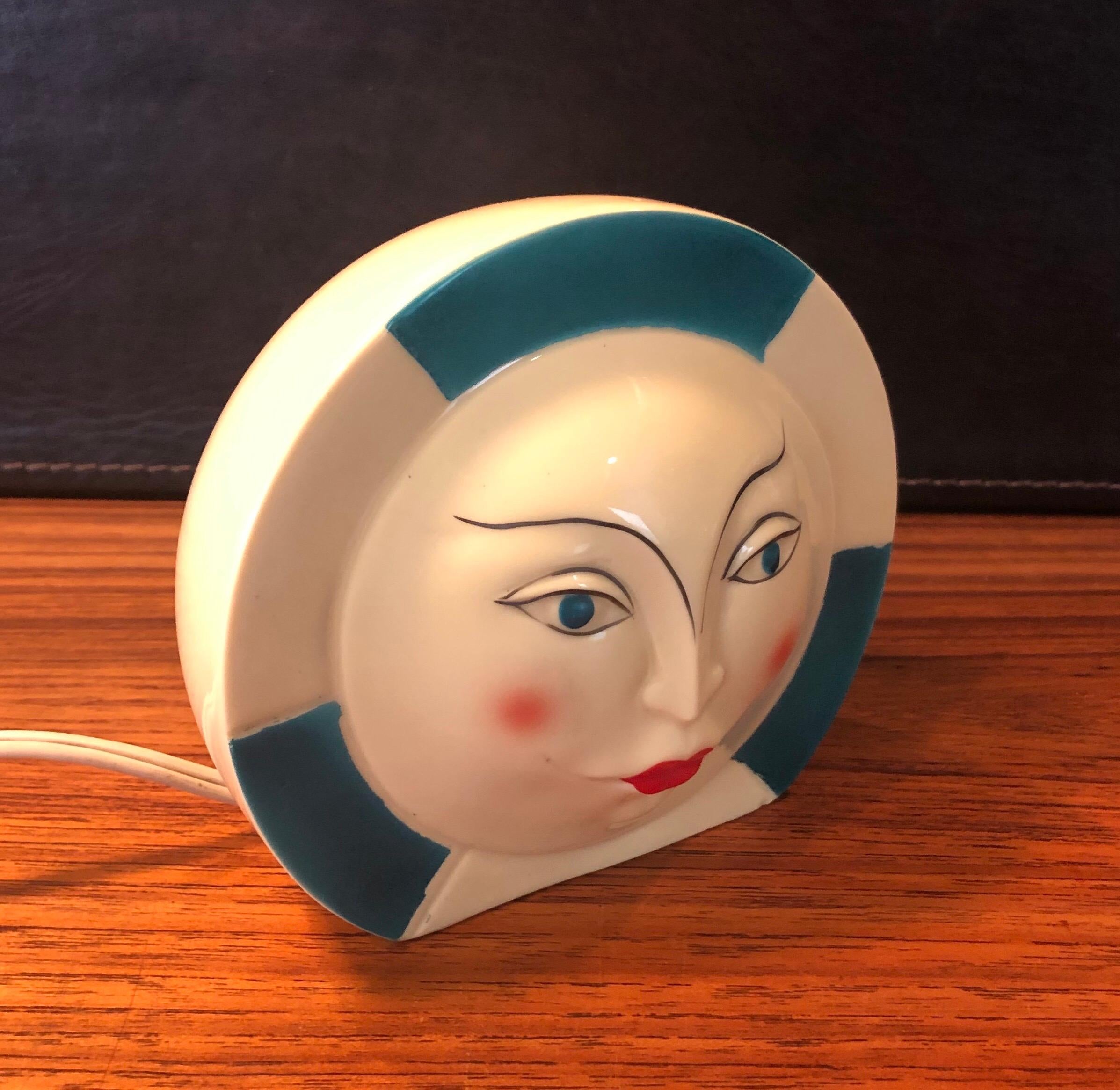 A very cool small Art Deco ceramic table lamp, circa 1940s. The lamp is in great condition with no chips, cracks or crazing and it measures 5.5