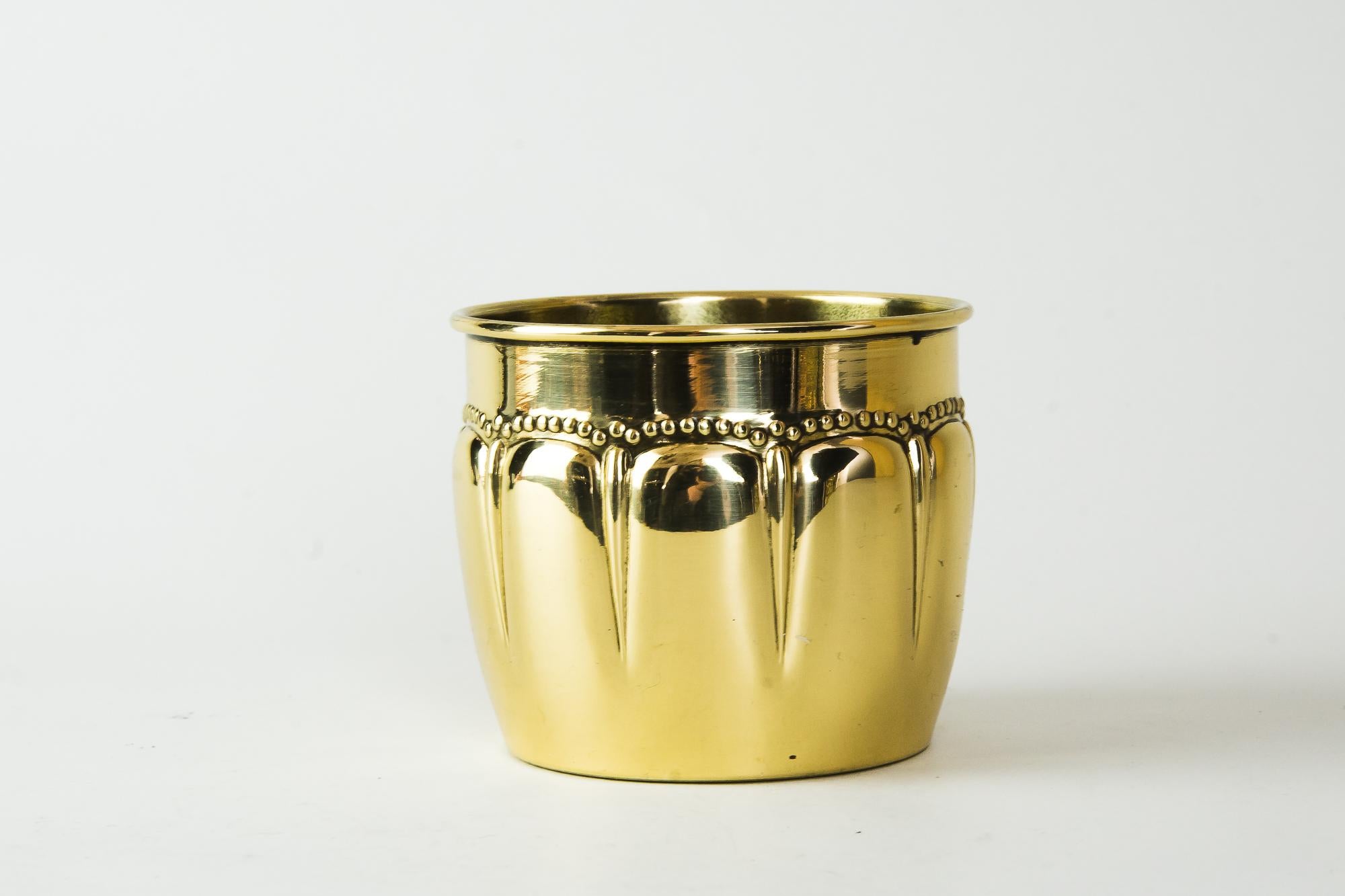 Small Art Deco flower pot, Vienna, circa 1920s
Brass polished and stove enameled.