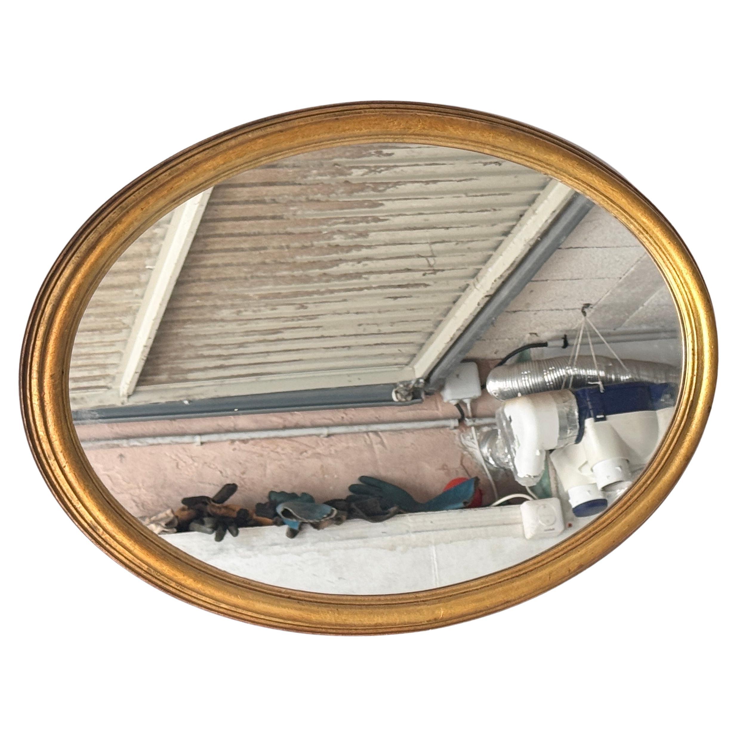 20th Century French Oval Mirror with Gilded Sculpted Frame – Horizontal or Vertical Display

Description:
This refined French oval mirror, crafted in the 20th century, features a beautifully sculpted gilded frame with layered contours that add depth