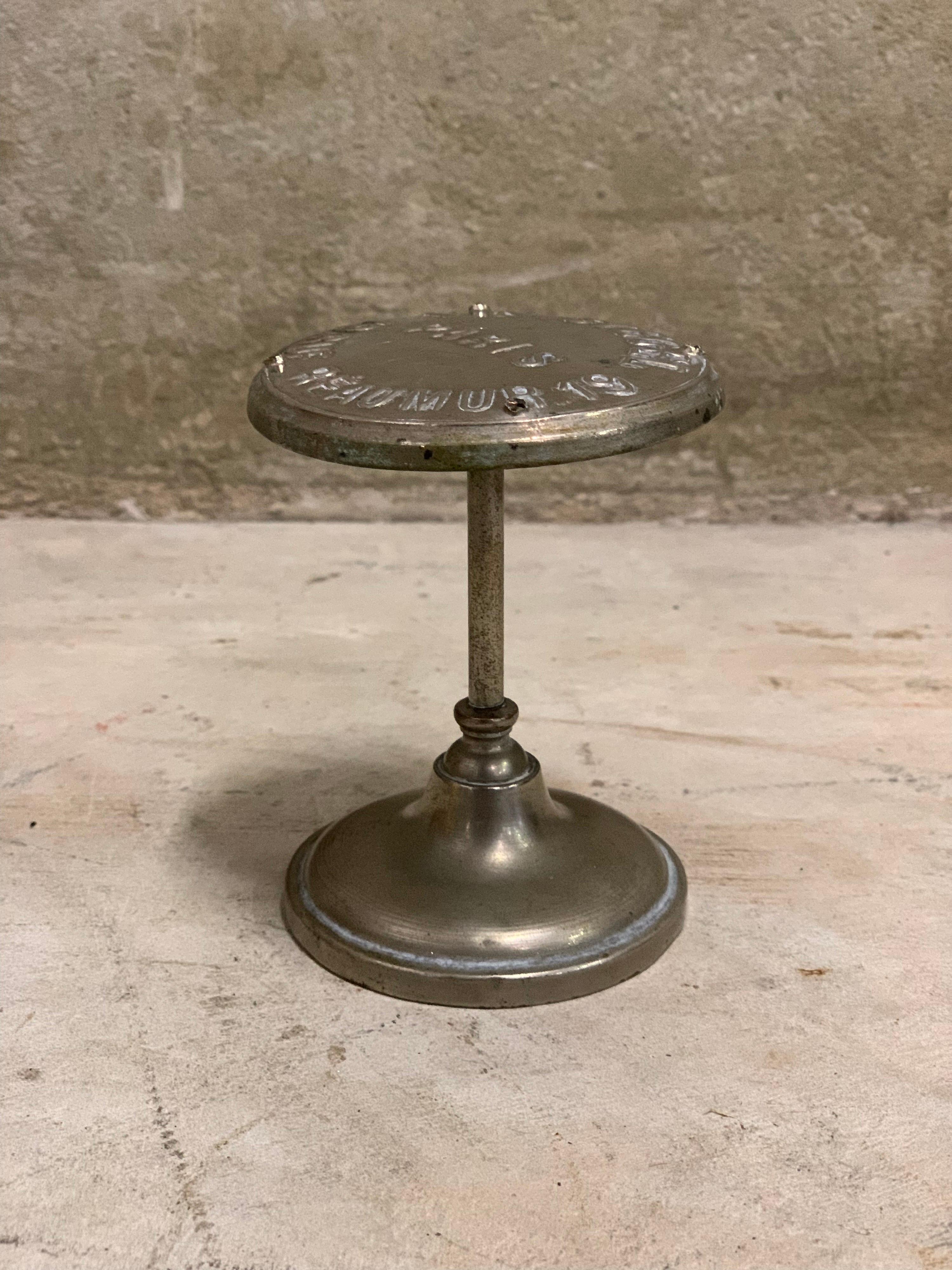Rare small store display stand from Siegel Paris. Early 20th century. Probably to display small items in departement stores like wallets for example. Marked on top nd on the bottom. Top has 4 holes in it for reasons unknown. Still in nice condition,