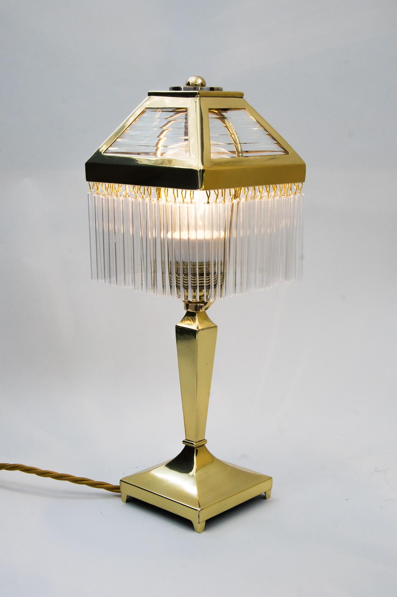 Small Art Deco table lamp, circa 1920s
Polished and stove enameled
Original glasses
Glass sticks are replaced (new).