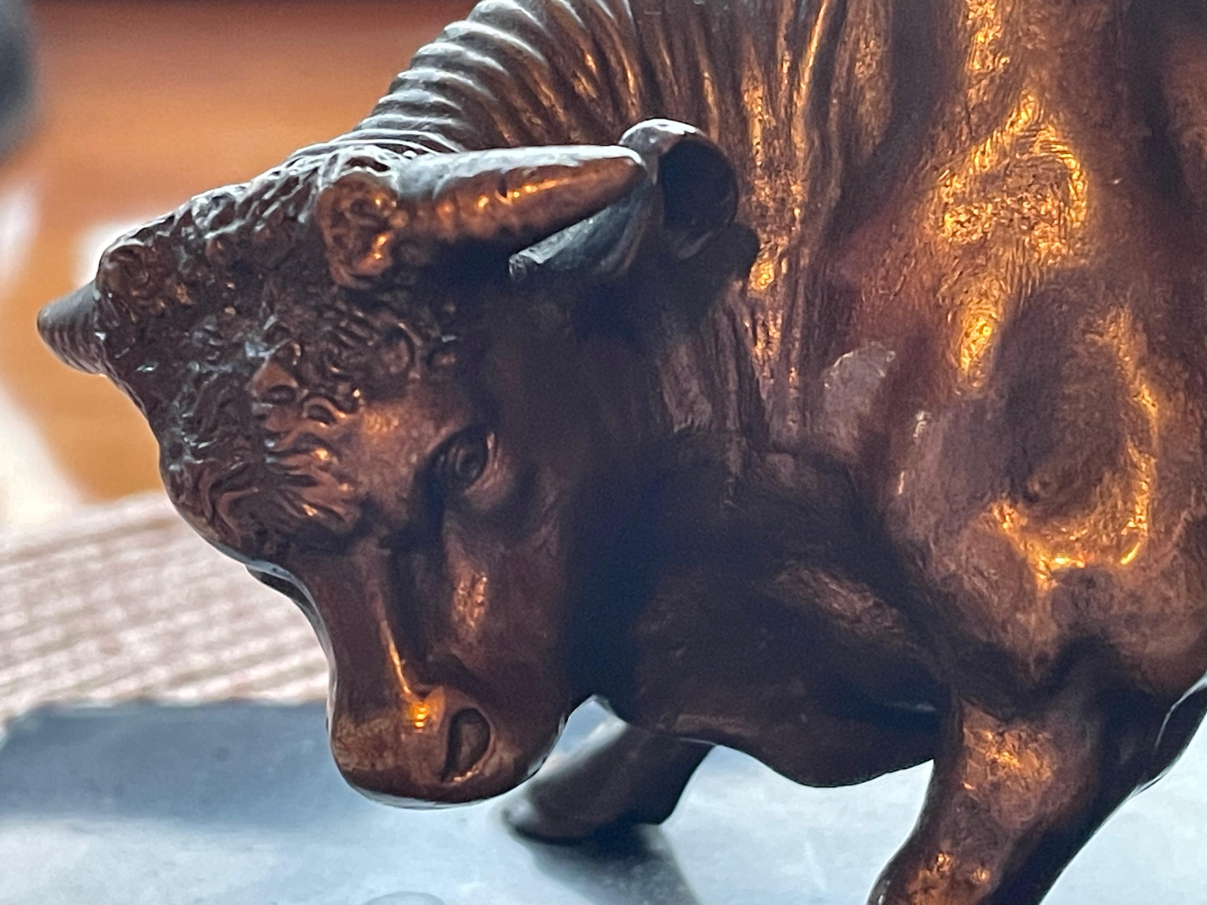 Fine Bronze of a small bull on a black belgian marble base.
The Original Bronze figure propably dates from the Art Nouveau or early Art Déco period in France.
These small bronzes were often used as decorative objects on writing desks.
The bull is