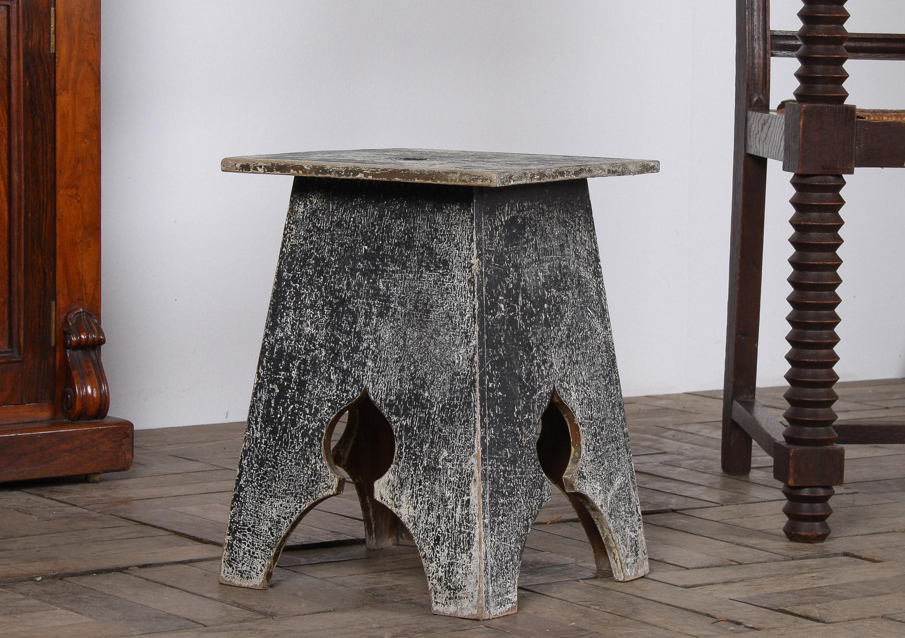 A charming Arts and Crafts Side Table, hand-painted and beautifully worn to reveal a wonderful rustic patina. The grey, nearly charcoal finish with white flecks has aged perfectly, exposing the wood underneath and adding character and texture to any