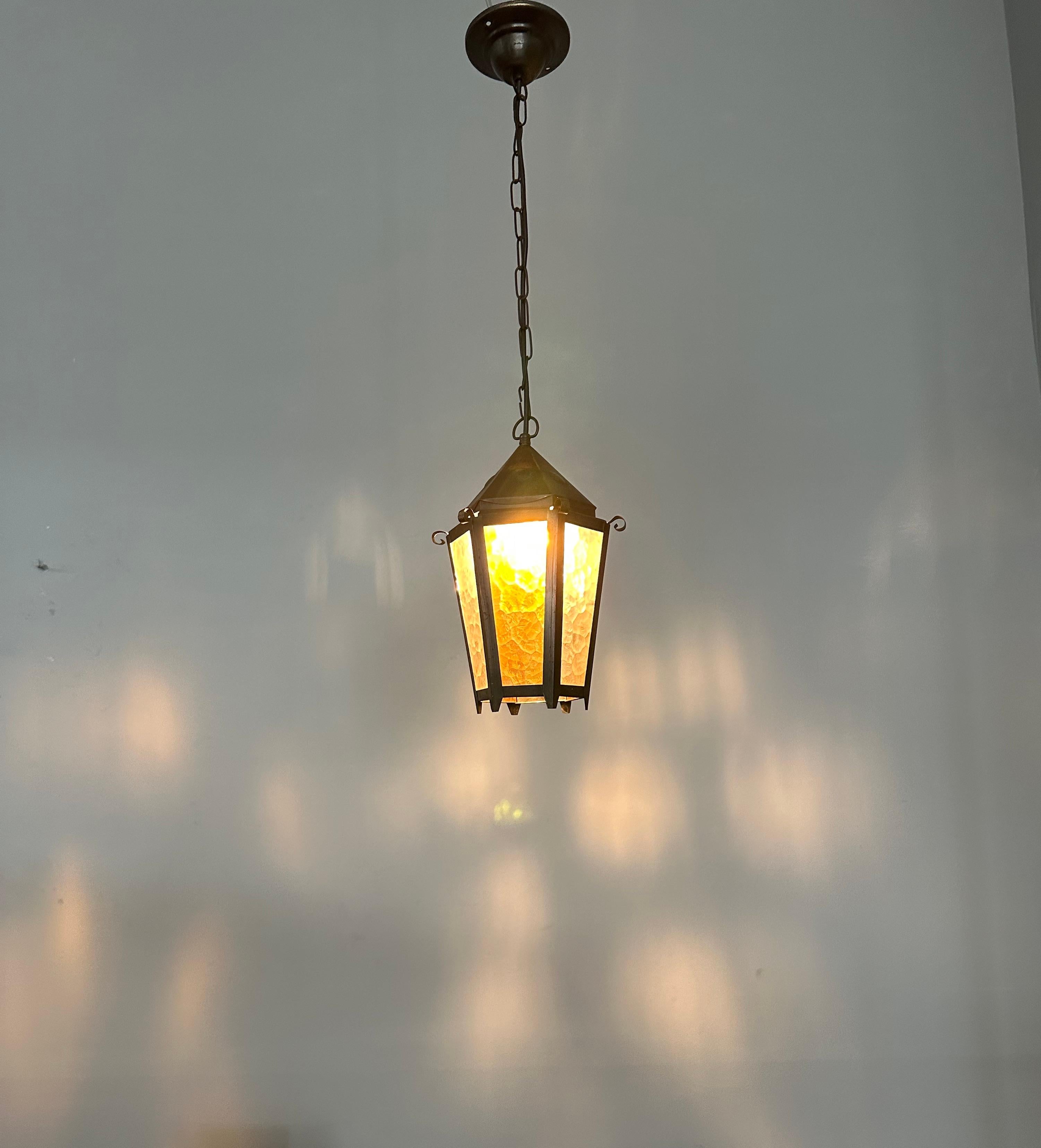 Good quality and small size, handcrafted entry hall light fixture.

With early 20th century lighting as one of our specialities, we are always happy to find a pendant, lantern or chandelier that we have never seen before. This Arts & Crafts lantern