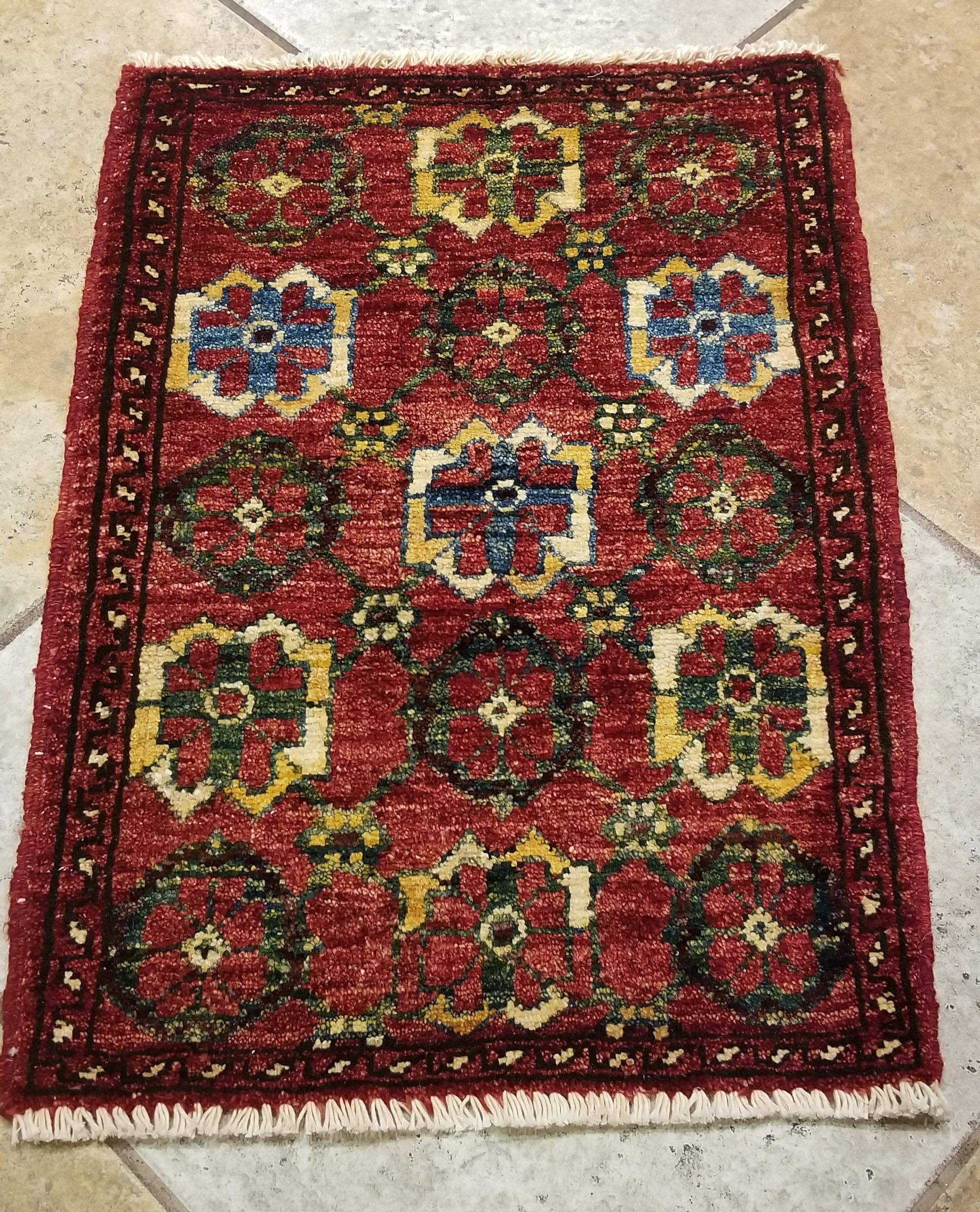 We carry some of the best Afghan bedside rugs, when you like to give your bedroom a colorful new look with one of our stunning carpets. This one measures approximately 25