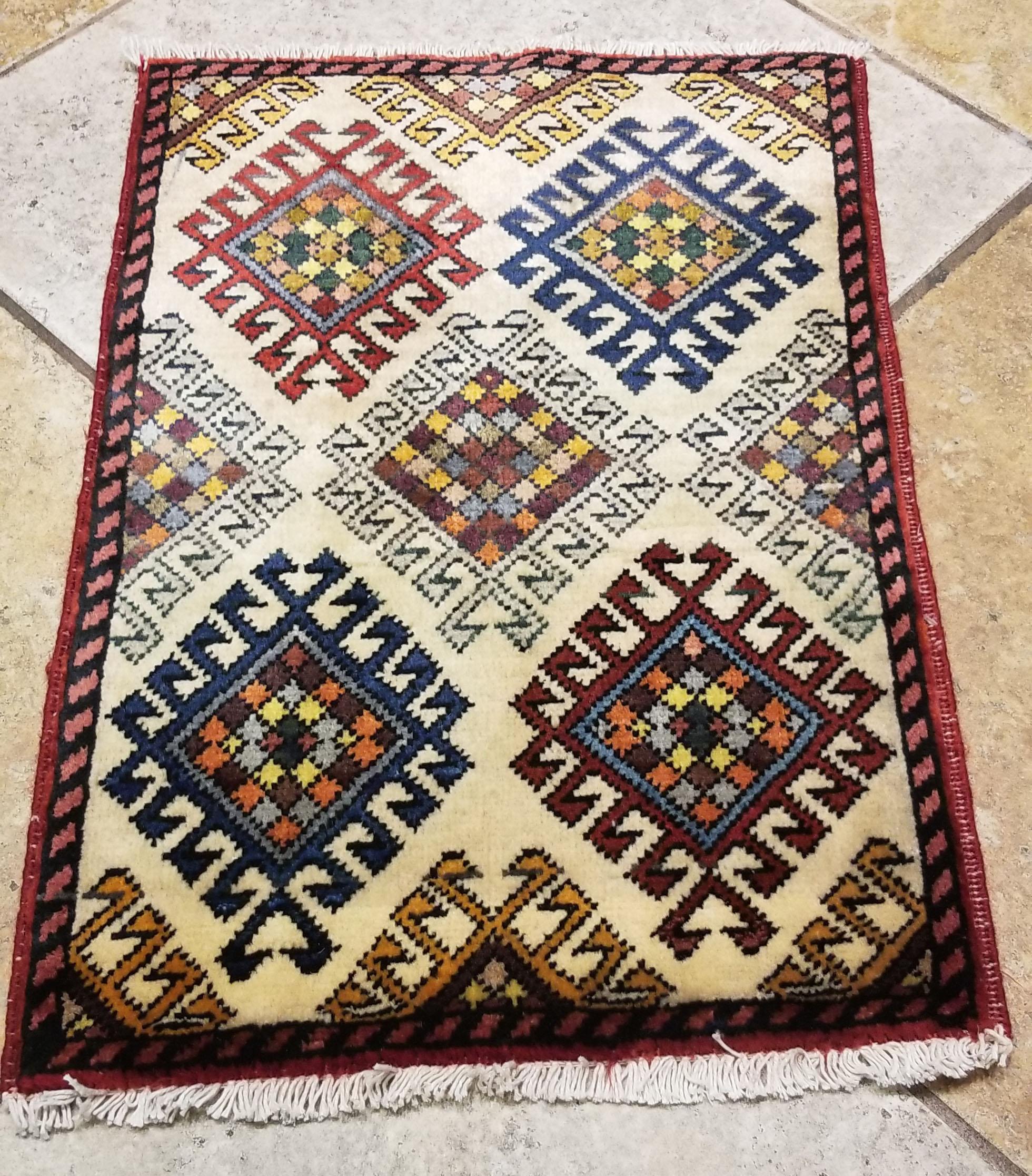 We carry some of the best Afghan bedside rugs, when you like to give your bedroom a colorful new look with one of our stunning carpets. This one measures approximately 25