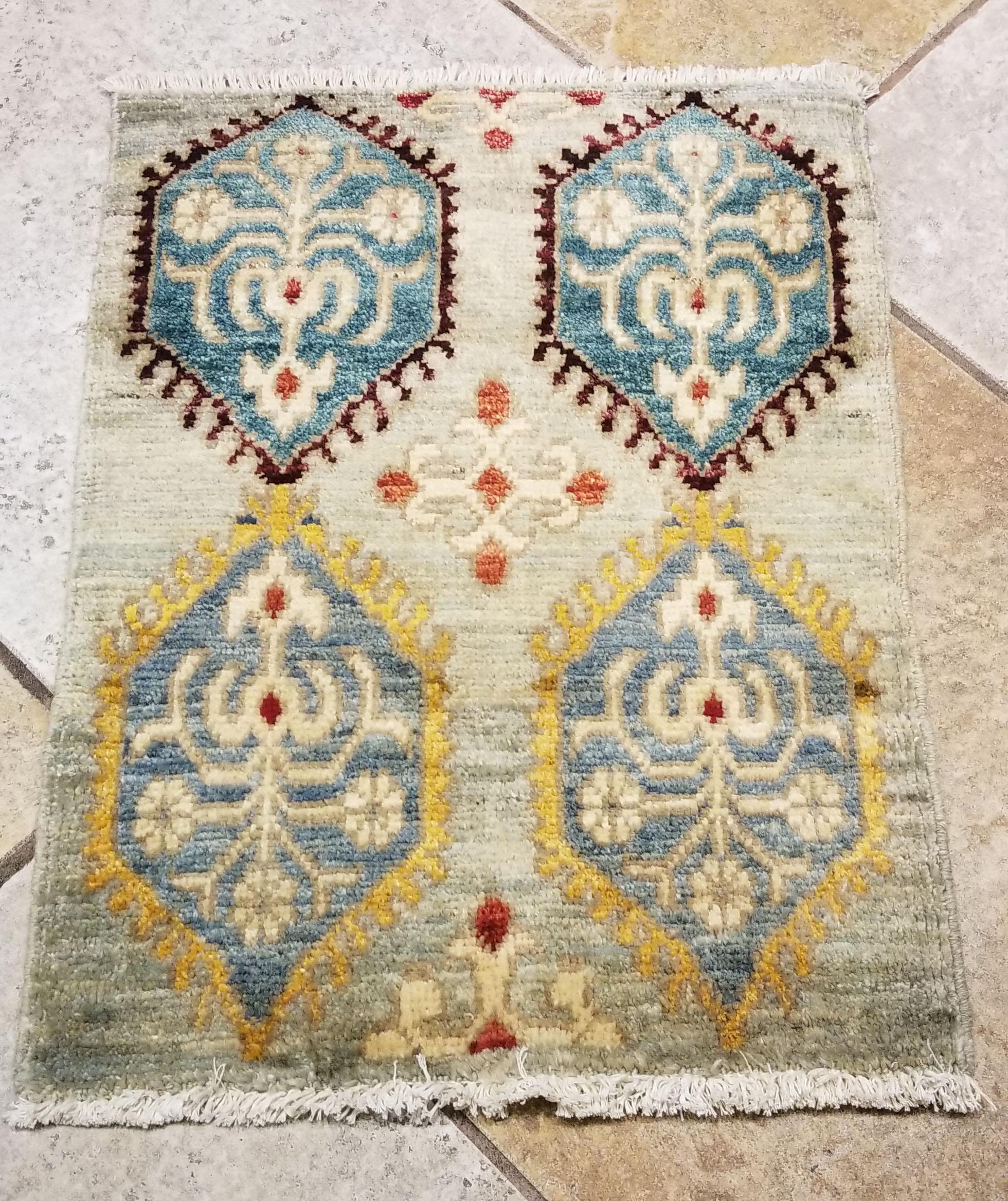 We carry some of the best Afghan bedside rugs, when you like to give your bedroom a colorful new look with one of our stunning carpets. This one measures approximately 24