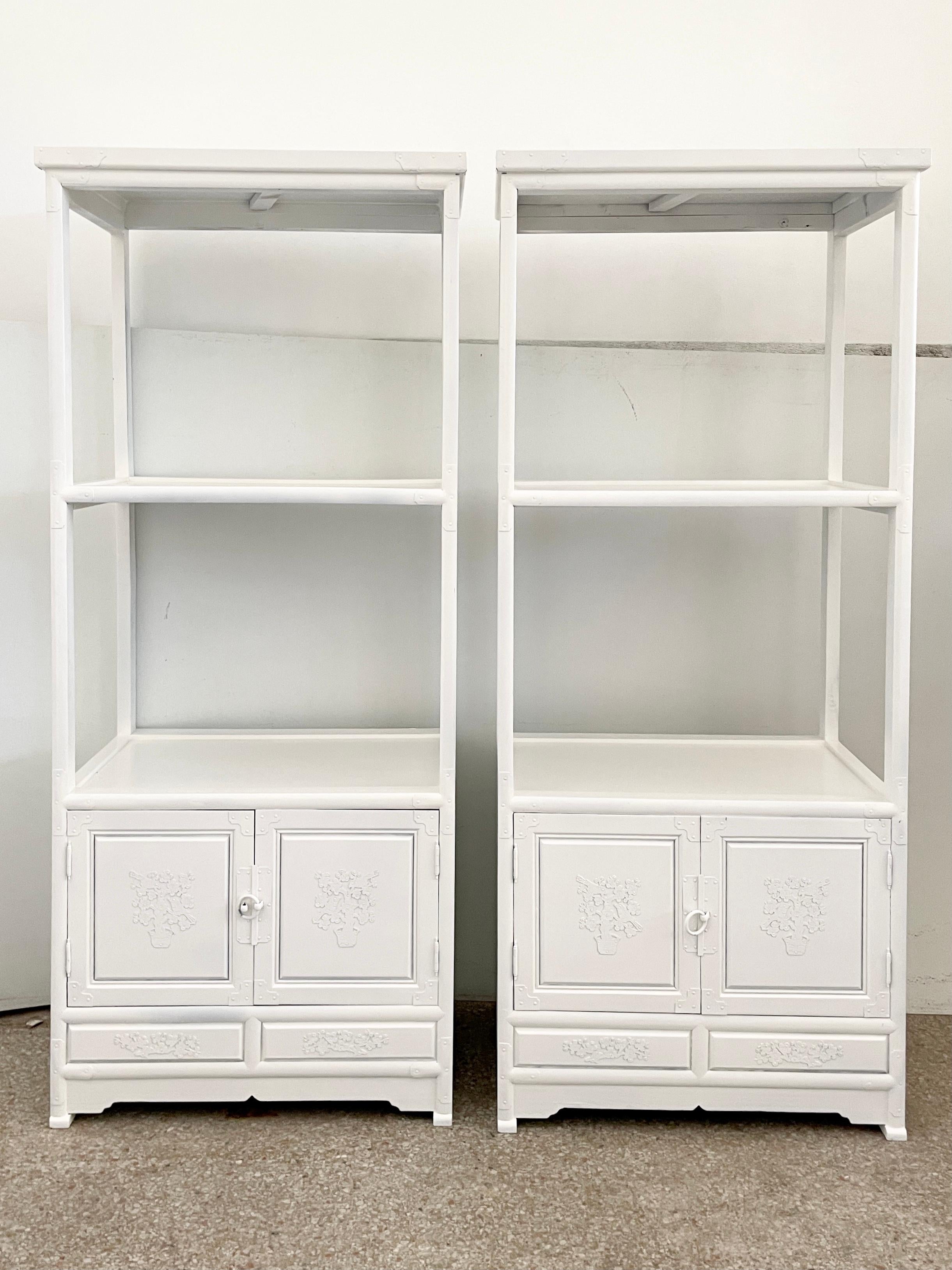 Beautiful pair of small etageres with two-door lower cabinets. Freshly lacquered in white.