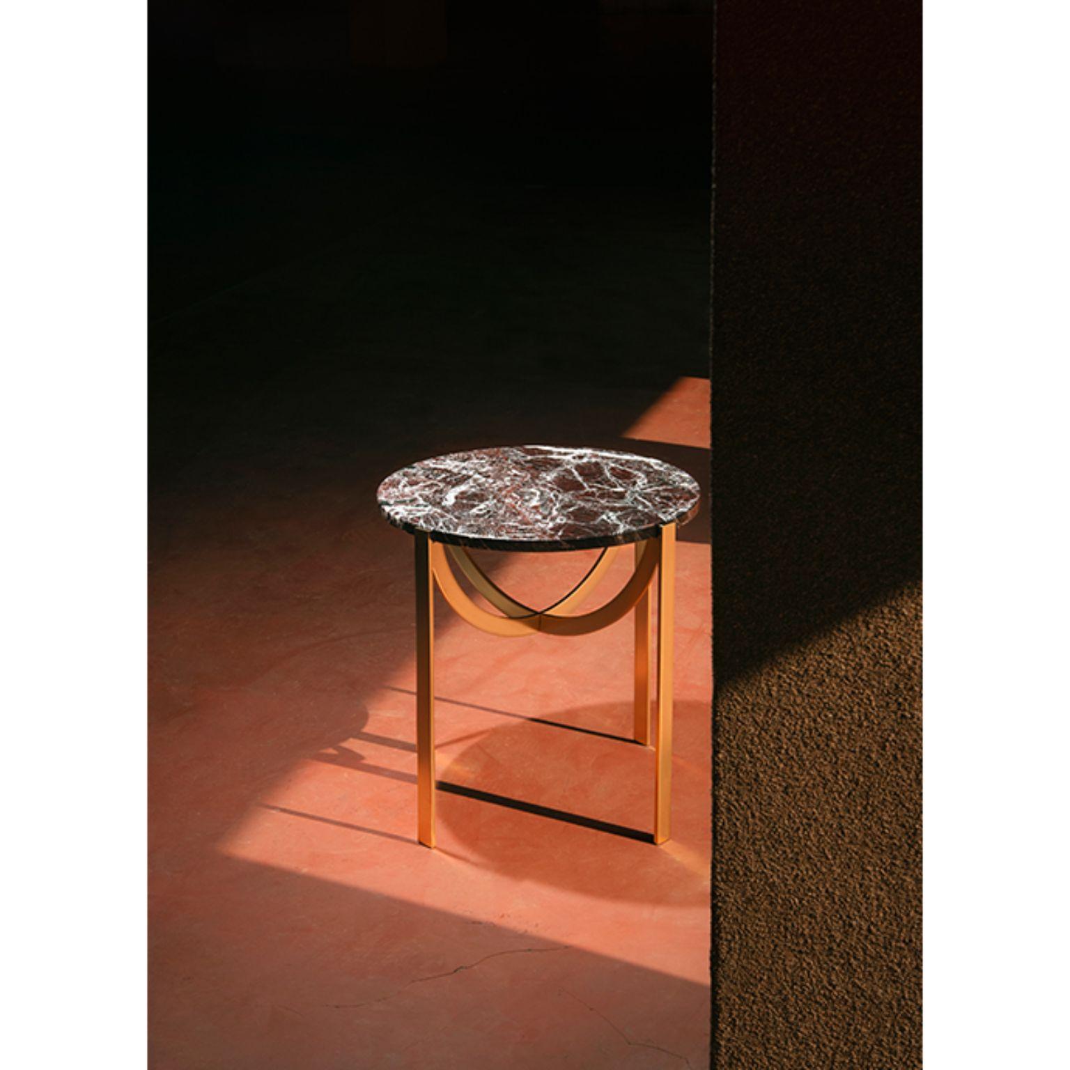 Astra coffee table by Patrick Norguet
Materials: Marble, metal structure
Dimensions: Ø51.4 x H 49.8 cm

The Astra family of coffee tables surprises by its sophisticated simplicity.
It was named as a tribute to those old instruments, which