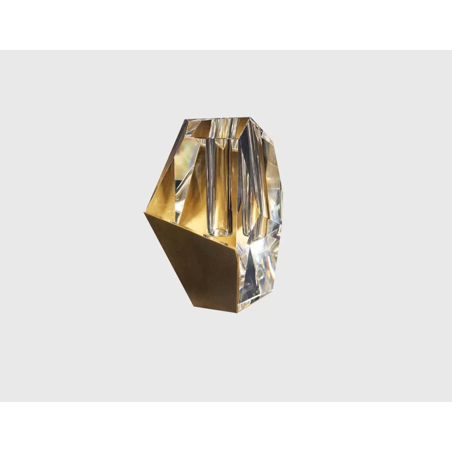 Small Asymmetrical Crystal Vase with Brass Accents by Dainte
Dimensions: D 11.5 x W 11.5 x H 18 cm.
Materials: Crystal and brass.

A modern crystal vase made of clear multifaceted crystal wrapped by a complementing brass shell lets your florals