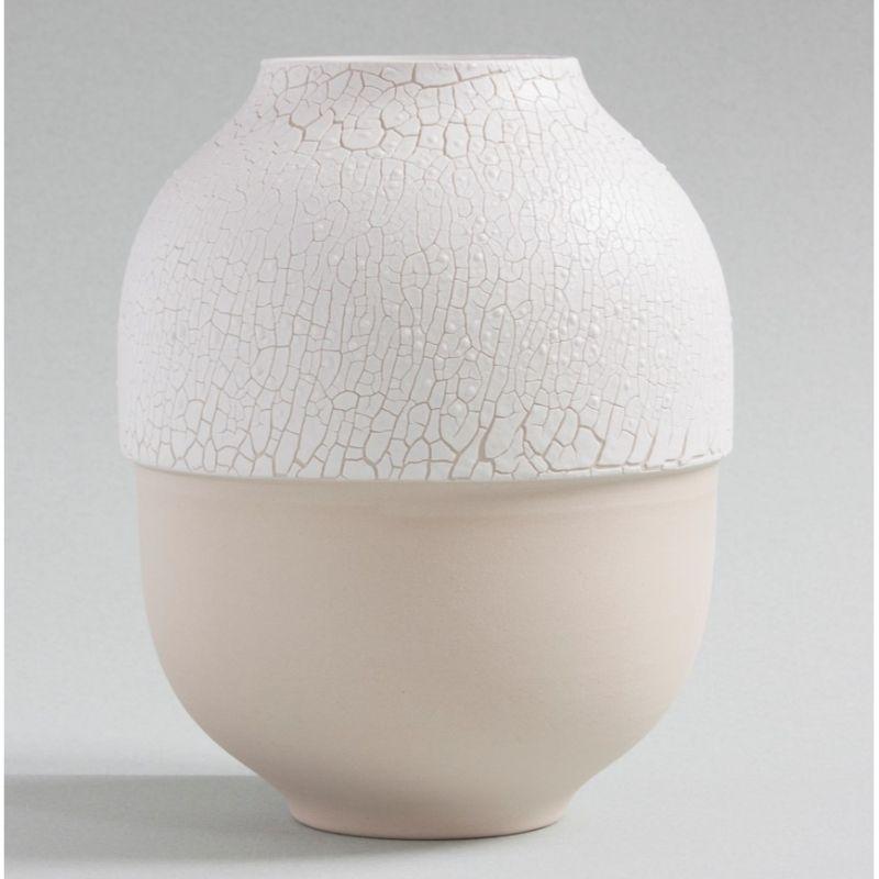Small Atacama vase by Josefina Munoz
Dimensions: D14 x H20 cm 
Material: Ceramic

Available in: Medium and Large sizes. 

This project is the result of the experimentation with a particular composition of glaze that cracks when fired,