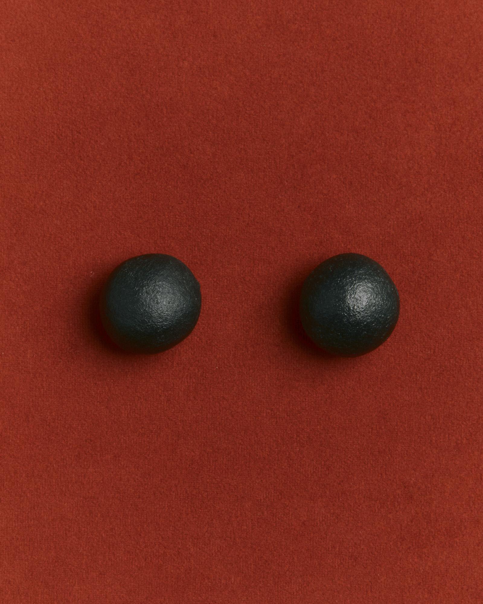 The original finish of the iron may wear and oxidize over time to reveal a distinctive patina. If preferred, use a quality metal wax to restore a consistent black finish. Re-waxing will need to be done more frequently in if installed in damp