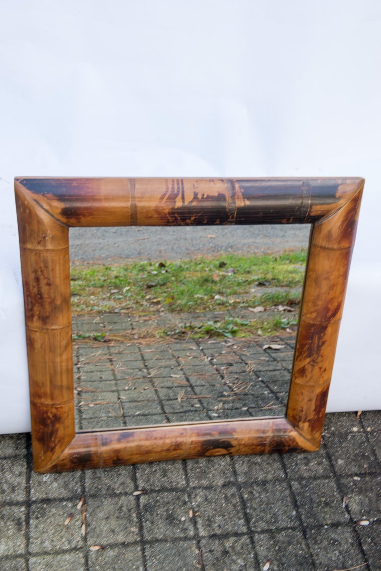 Wide square bamboo mirror. Interesting natural coloration. Mirror only dimensions: 17.25 x 17.25.