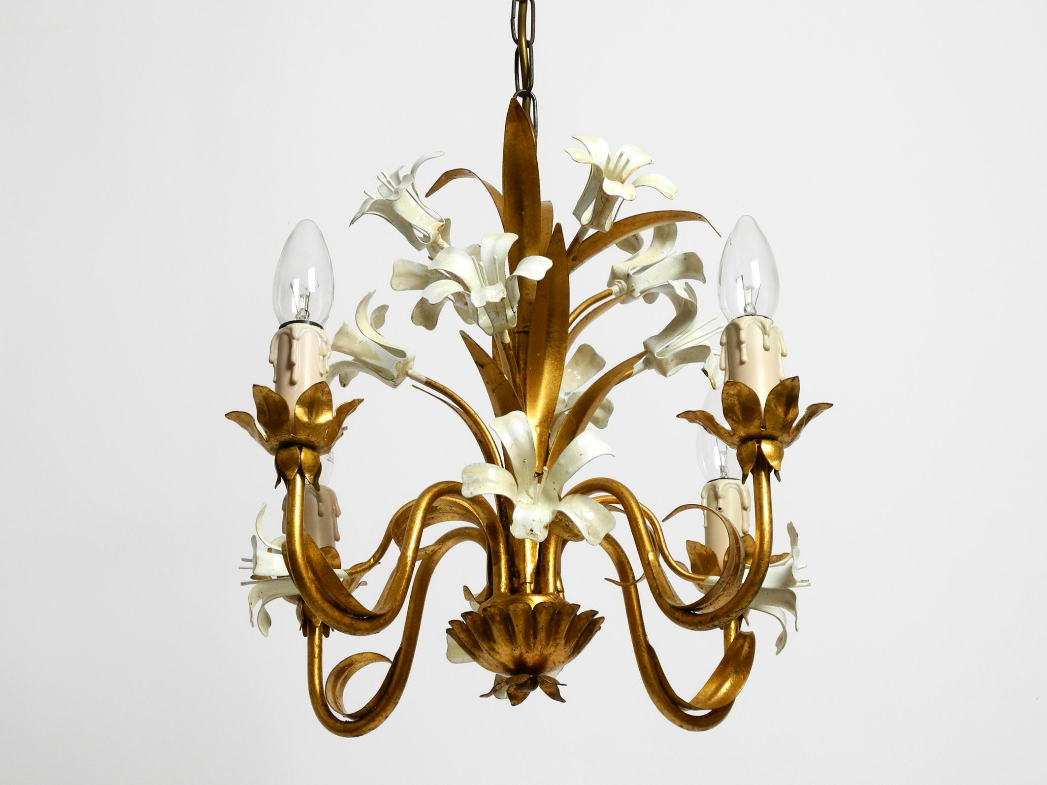 European Small beautiful 1960s gold-plated 4-arm metal chandelier For Sale