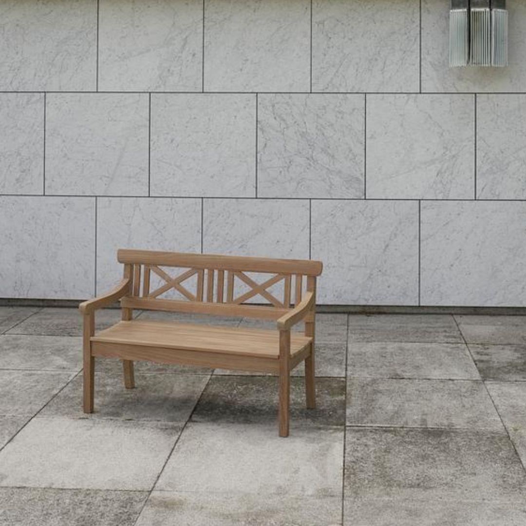 Small Bernt Santesson outdoor 'Drachmann 120' teak bench for Skagerak

Skagerak was founded in 1976 by Jesper and Vibeke Panduro, who took inspiration from their love of Scandinavian design and its rich tradition. The brand emphasizes