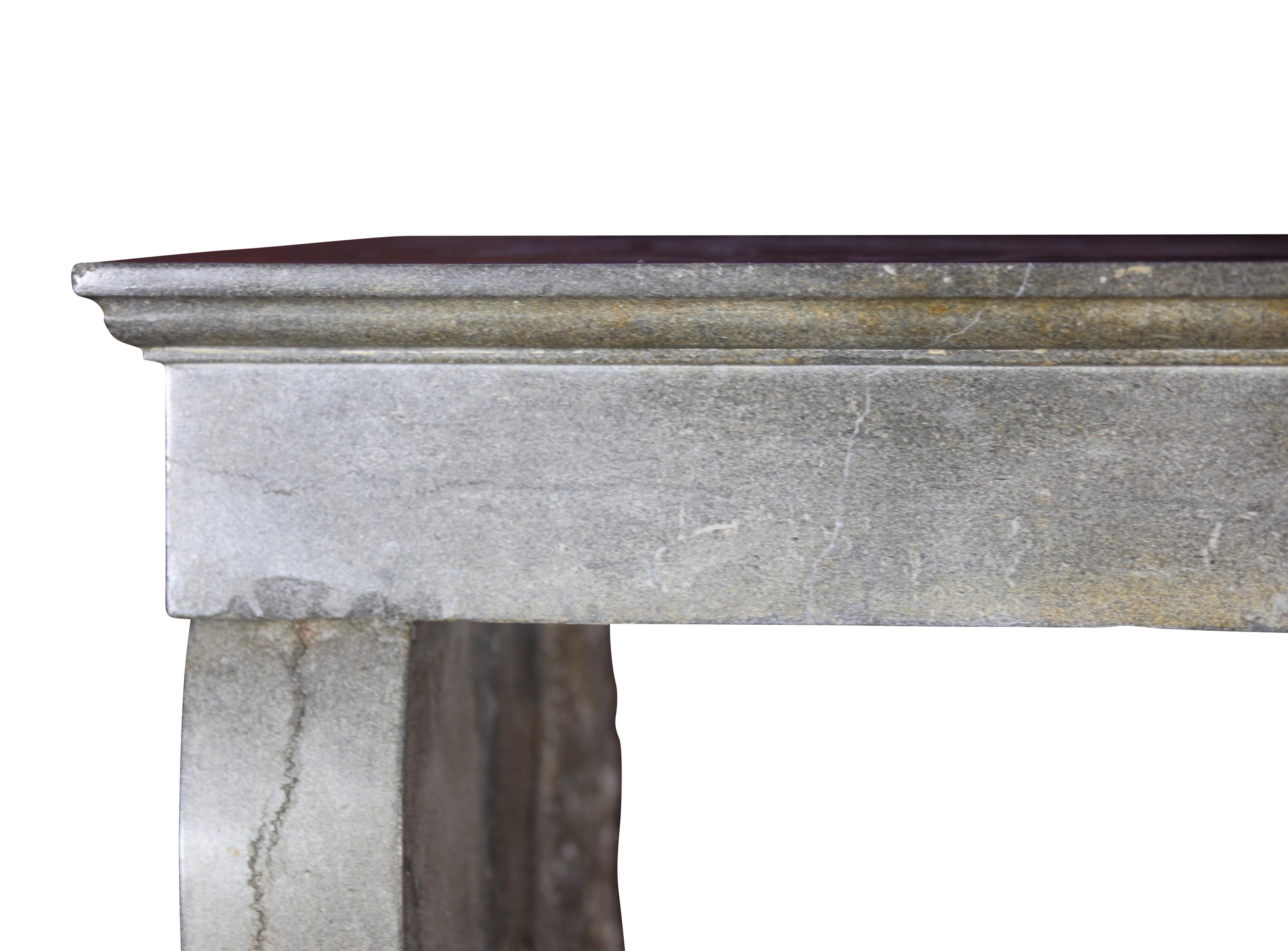 A fine petite French country vintage fire surround in a bicolor Burgundy hard stone with very nice patina and oxidation and unusual deep shelf. It is built in the 19th century.
Measures:
114 cm exterior width 44.88 inch
98 cm exterior height
