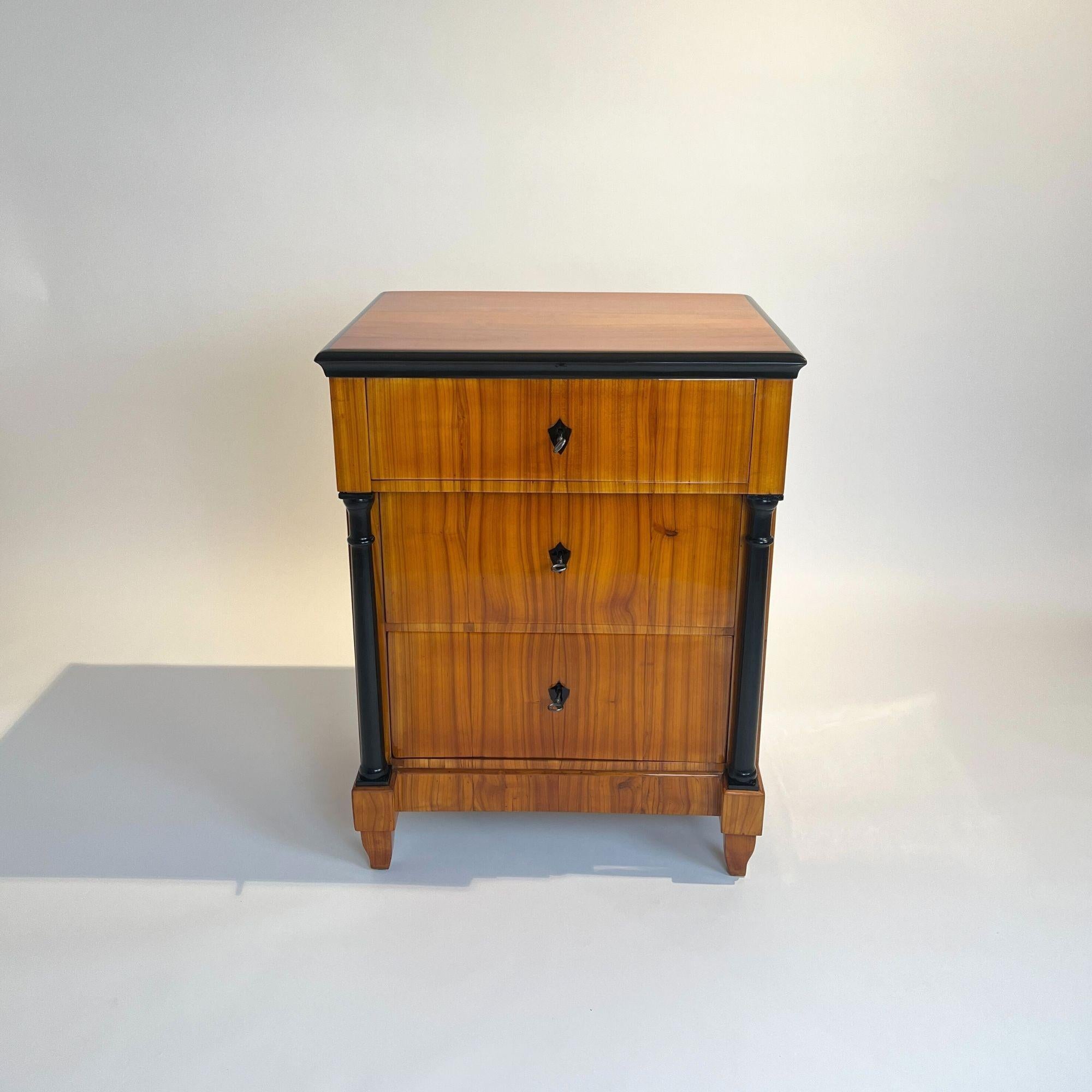 Small Biedermeier commode or chest of drawers in cherrywood from South Germany circa 1830.

Small, elegant, three-drawer Biedermeier commode or chest of drawers from southern Germany around 1830.
Blonde Cherry wood veneered on softwood and solid