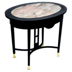 Small black Art Nouveau Table with Marble-Plate and Brass-Fittings (circa 1910)