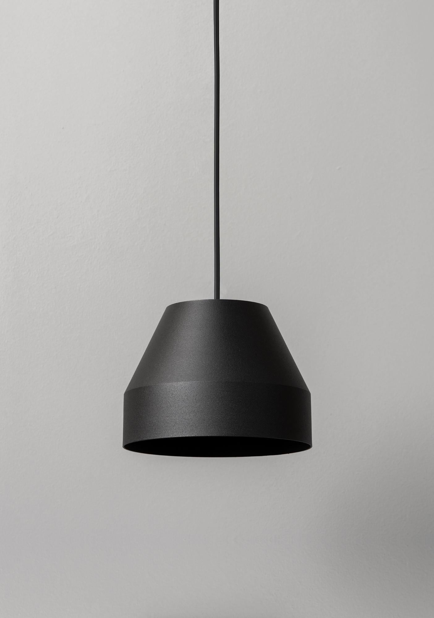 Small Black Cap Pendant Lamp by +kouple
Dimensions: Ø 16 x H 12 cm. 
Materials: Powder-coated steel.

Available in different color options. The rod length is 200 cm. Please contact us.

All our lamps can be wired according to each country. If sold