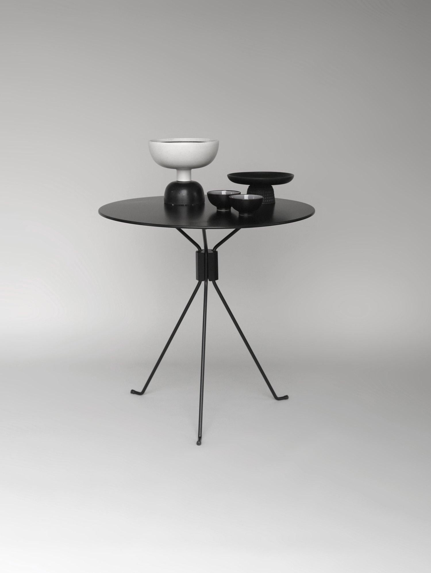 Small black Capri bond table by Cools Collection
Materials: Steel, paint.
Dimensions: Ø 75 x H 74 cm.
Available in black or white table top.

COOLS Collection was launched in 2020 by mother-and-daughter duo Stefania Andorlini and Maria